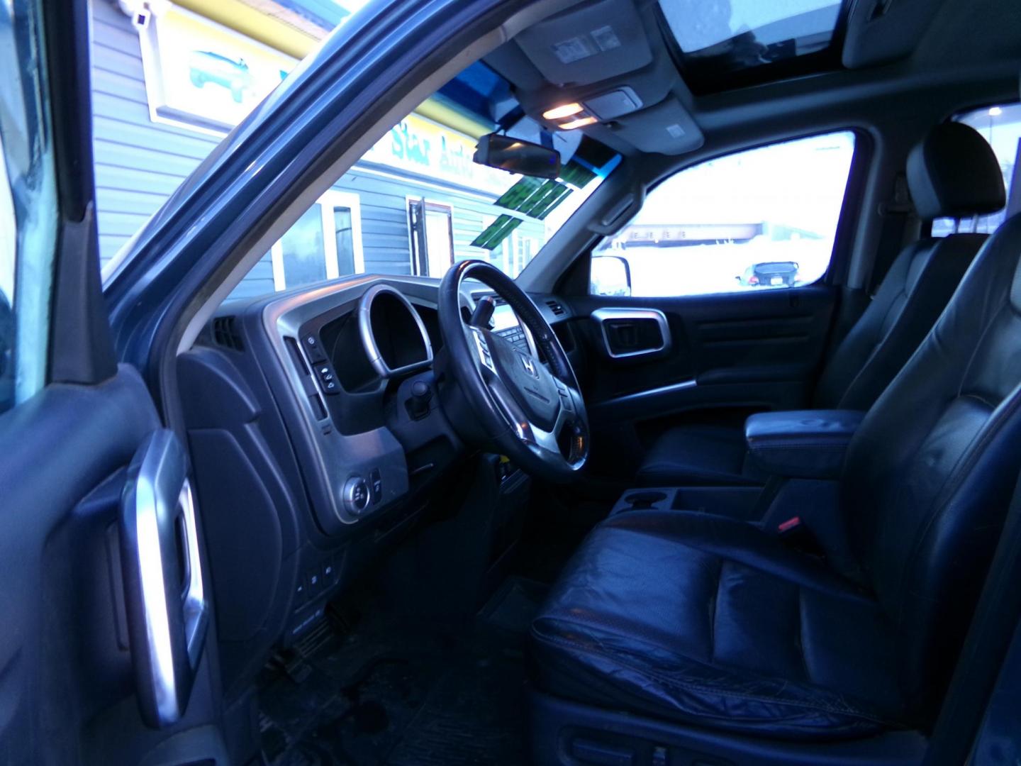 2006 Blue Honda Ridgeline RTL (2HJYK16576H) with an 3.5L V6 SOHC 24V engine, 5-Speed Automatic Overdrive transmission, located at 2630 Philips Field Rd., Fairbanks, AK, 99709, (907) 458-0593, 64.848068, -147.780609 - Photo#4