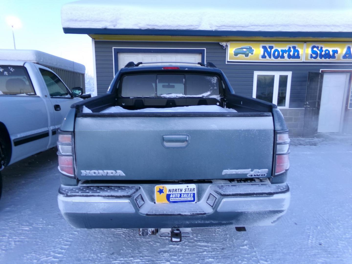 2006 Blue Honda Ridgeline RTL (2HJYK16576H) with an 3.5L V6 SOHC 24V engine, 5-Speed Automatic Overdrive transmission, located at 2630 Philips Field Rd., Fairbanks, AK, 99709, (907) 458-0593, 64.848068, -147.780609 - Photo#3