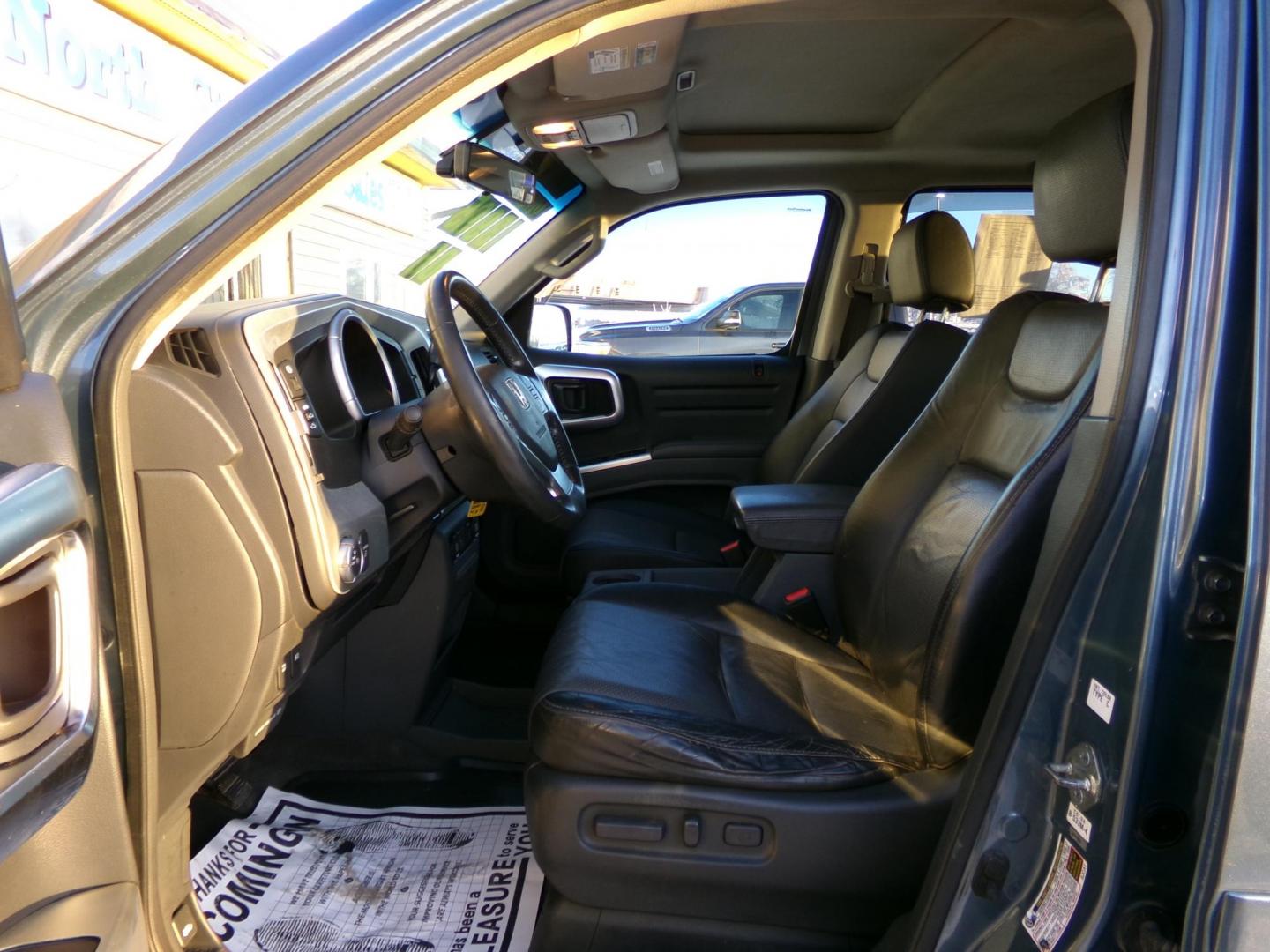 2006 Blue Honda Ridgeline RTL (2HJYK16576H) with an 3.5L V6 SOHC 24V engine, 5-Speed Automatic Overdrive transmission, located at 2630 Philips Field Rd., Fairbanks, AK, 99709, (907) 458-0593, 64.848068, -147.780609 - Photo#4