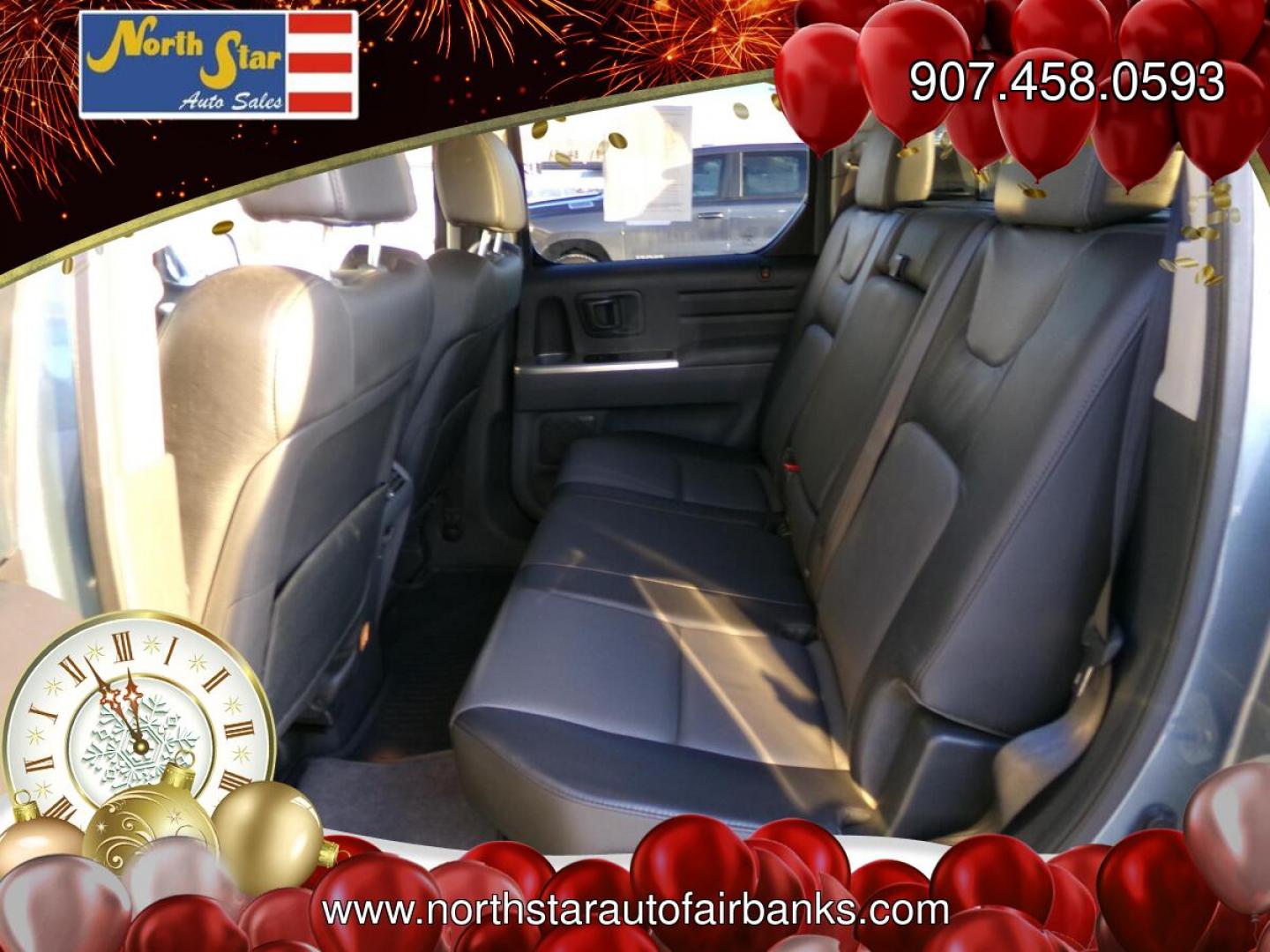 2006 Blue Honda Ridgeline RTL (2HJYK16576H) with an 3.5L V6 SOHC 24V engine, 5-Speed Automatic Overdrive transmission, located at 2630 Philips Field Rd., Fairbanks, AK, 99709, (907) 458-0593, 64.848068, -147.780609- Photo#5