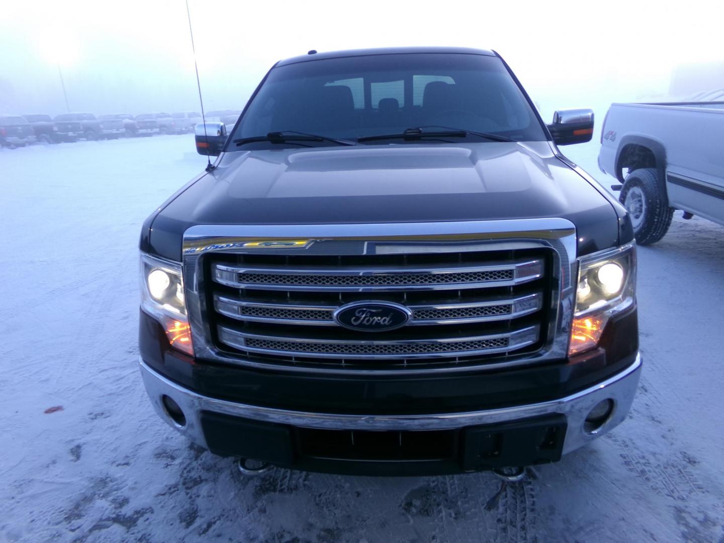 2014 Black Ford F-150 SuperCrew 5.5-ft. Bed 4WD (1FTFW1ET8EF) with an 3.5L V6 TURBO engine, 6-Speed Automatic transmission, located at 2630 Philips Field Rd., Fairbanks, AK, 99709, (907) 458-0593, 64.848068, -147.780609 - Photo#1