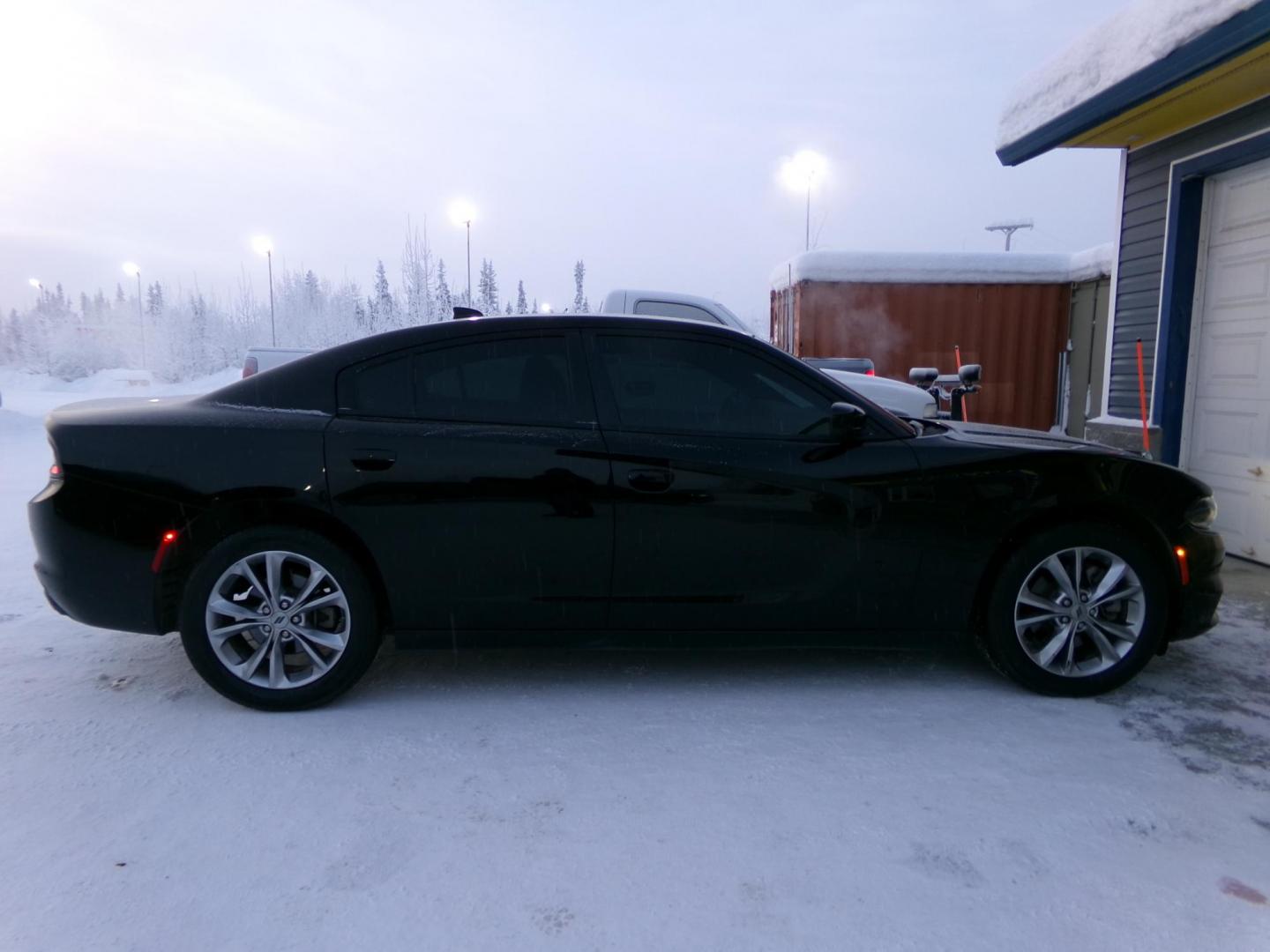 2022 Black Dodge Charger SXT AWD (2C3CDXJG4NH) with an 3.6L V6 DOHC 24V engine, 8A transmission, located at 2630 Philips Field Rd., Fairbanks, AK, 99709, (907) 458-0593, 64.848068, -147.780609 - Photo#2