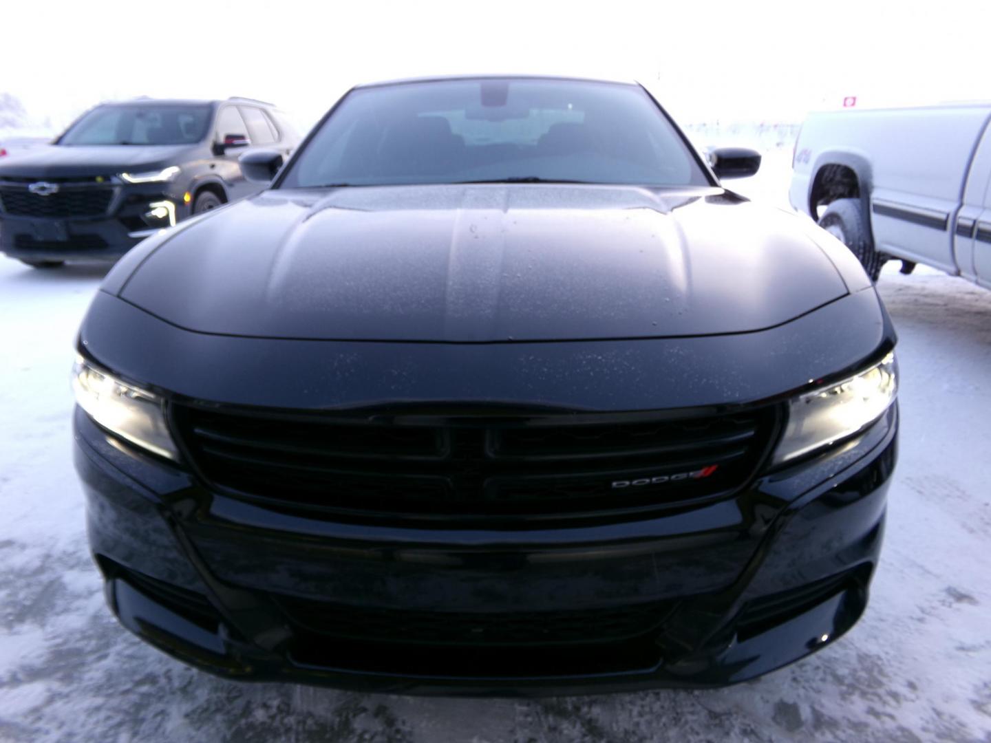 2022 Black Dodge Charger SXT AWD (2C3CDXJG4NH) with an 3.6L V6 DOHC 24V engine, 8A transmission, located at 2630 Philips Field Rd., Fairbanks, AK, 99709, (907) 458-0593, 64.848068, -147.780609 - Photo#1