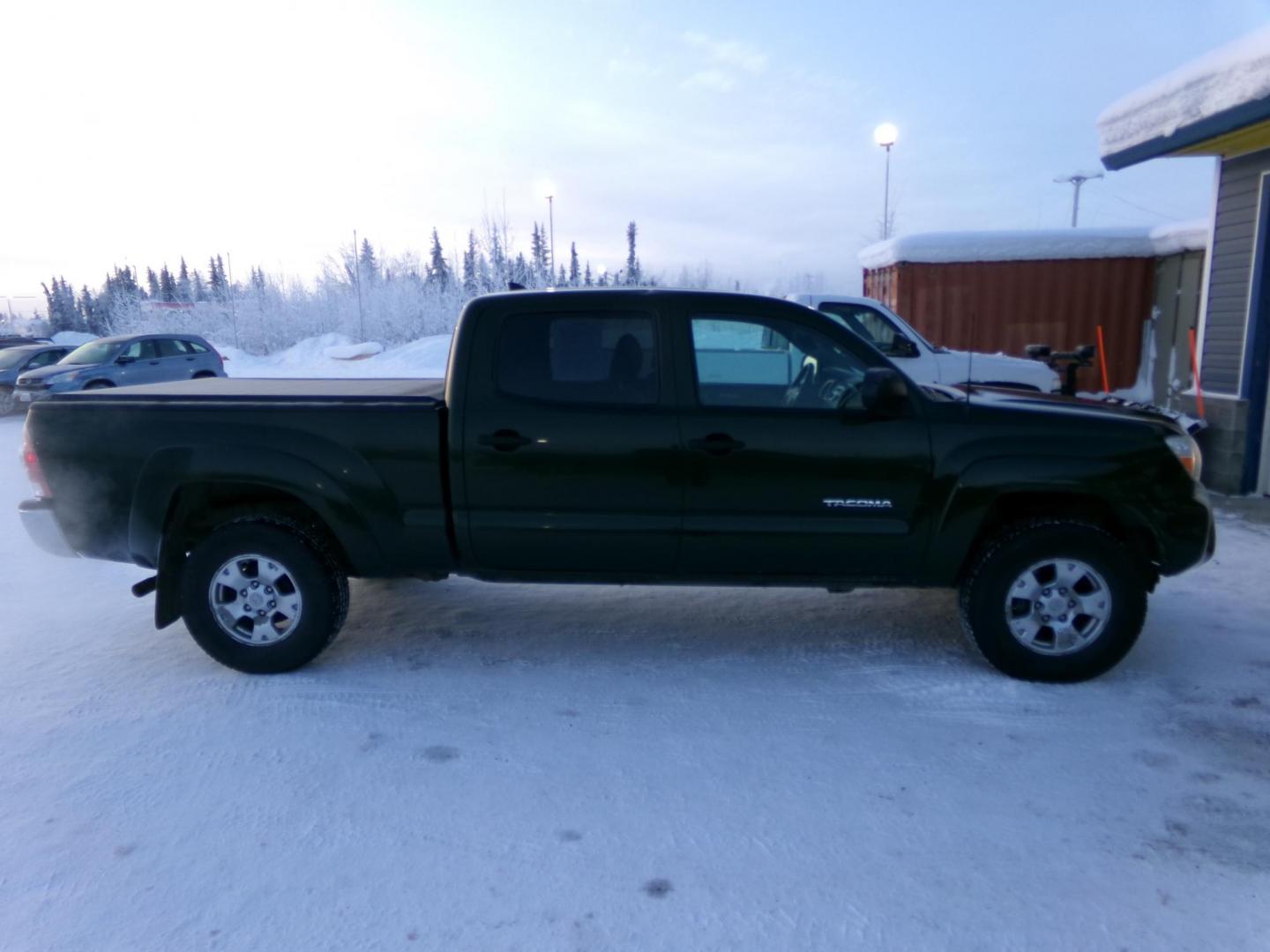 2012 Green Toyota Tacoma Double Cab Long Bed V6 Auto 4WD (3TMMU4FN8CM) with an 4.0L V6 DOHC 24V engine, 5-Speed Automatic transmission, located at 2630 Philips Field Rd., Fairbanks, AK, 99709, (907) 458-0593, 64.848068, -147.780609 - Photo#2