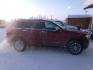 2015 Red Jeep Grand Cherokee Limited 4WD (1C4RJFBG7FC) with an 3.6L V6 DOHC 24V engine, 8-Speed Automatic transmission, located at 2630 Philips Field Rd., Fairbanks, AK, 99709, (907) 458-0593, 64.848068, -147.780609 - Photo#2