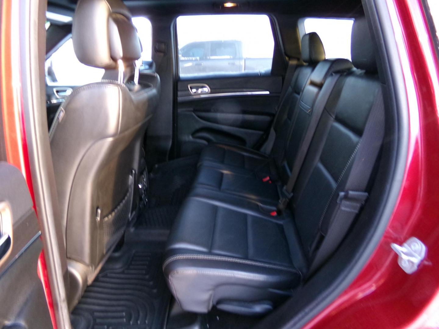 2015 Red Jeep Grand Cherokee Limited 4WD (1C4RJFBG7FC) with an 3.6L V6 DOHC 24V engine, 8-Speed Automatic transmission, located at 2630 Philips Field Rd., Fairbanks, AK, 99709, (907) 458-0593, 64.848068, -147.780609 - Photo#5