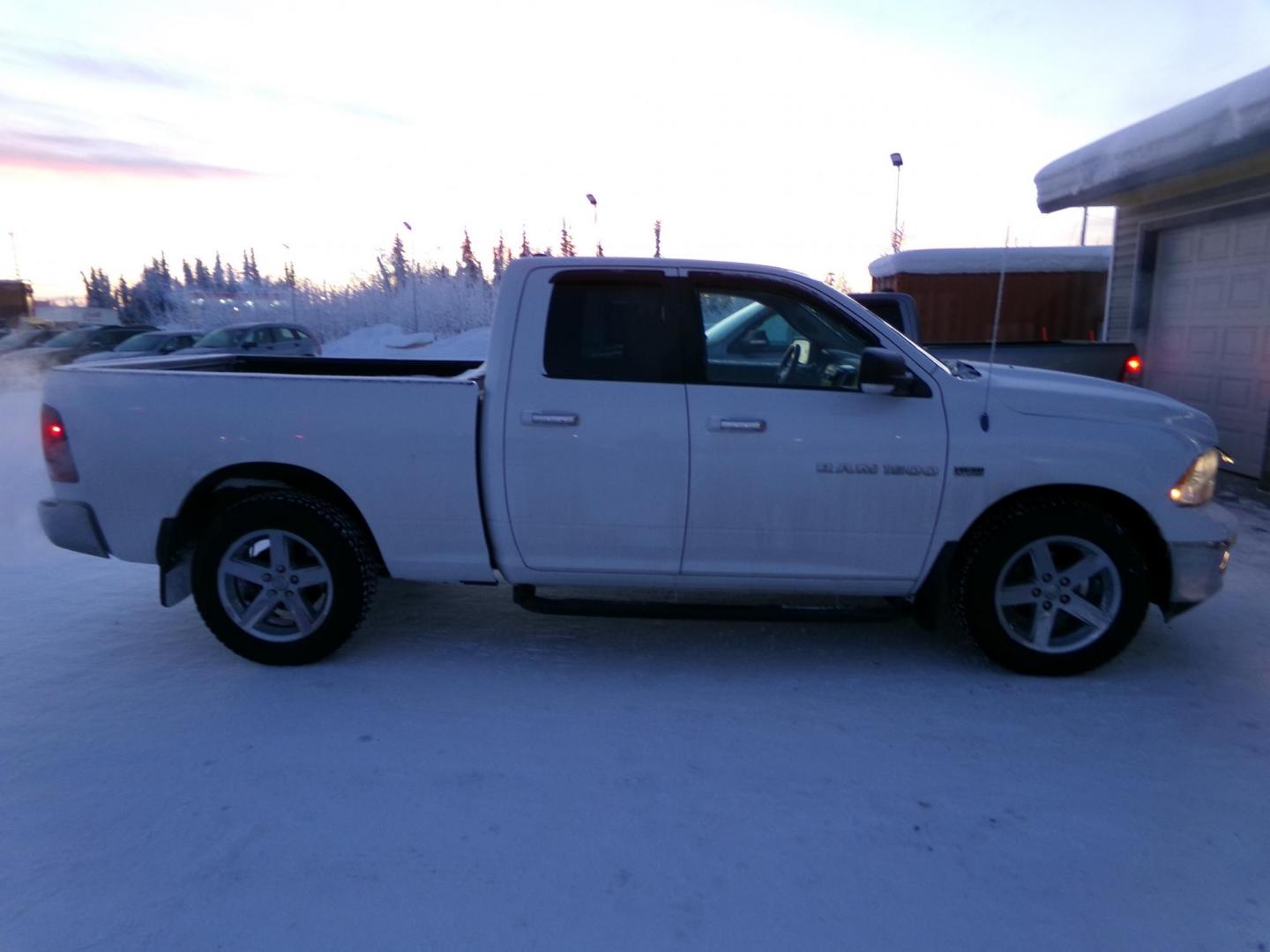 2011 White Dodge Ram 1500 Sport Quad Cab 4WD (1D7RV1GTXBS) with an 5.7L V8 OHV 16V engine, 5-Speed Automatic transmission, located at 2630 Philips Field Rd., Fairbanks, AK, 99709, (907) 458-0593, 64.848068, -147.780609 - Photo#1