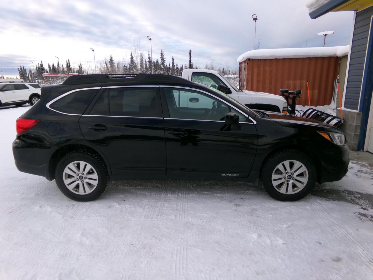 2016 Black Subaru Outback 2.5i Premium (4S4BSBDCXG3) with an 2.5L H4 DOHC 16V engine, CVT transmission, located at 2630 Philips Field Rd., Fairbanks, AK, 99709, (907) 458-0593, 64.848068, -147.780609 - Photo#2
