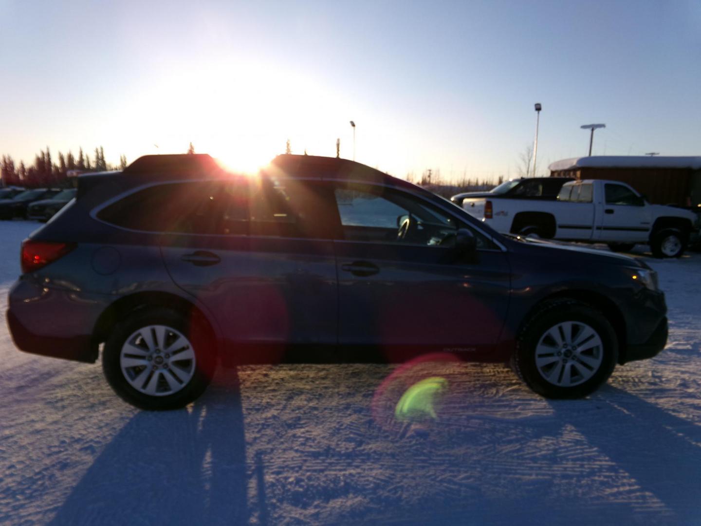 2018 Blue Subaru Outback 2.5i Premium (4S4BSACC6J3) with an 2.5L H4 DOHC 16V engine, CVT transmission, located at 2630 Philips Field Rd., Fairbanks, AK, 99709, (907) 458-0593, 64.848068, -147.780609 - Photo#2