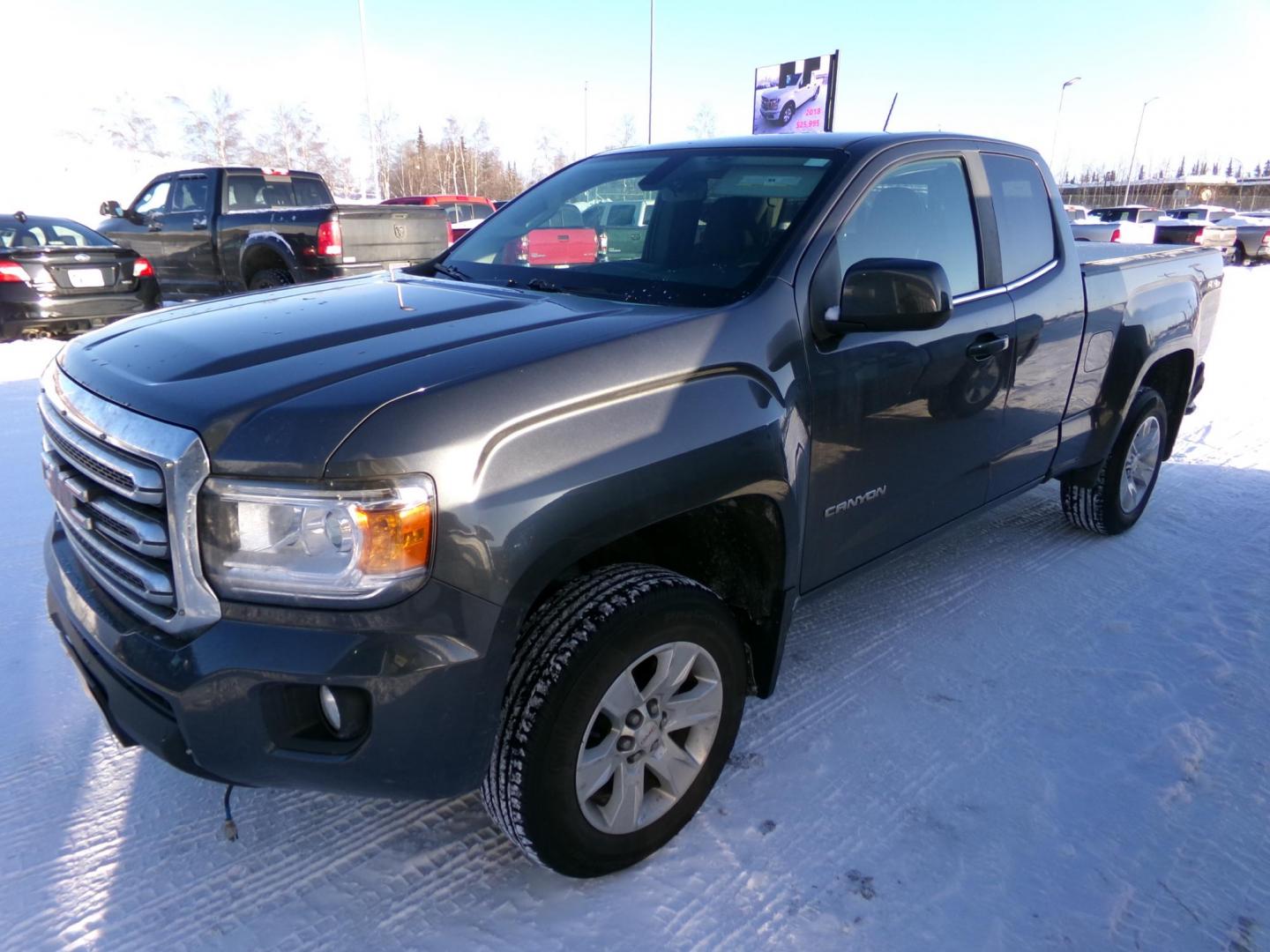 2016 Grey GMC Canyon SLE Ext. Cab 4WD (1GTH6CE38G1) with an 3.6L V6 DOHC 24V engine, 6A transmission, located at 2630 Philips Field Rd., Fairbanks, AK, 99709, (907) 458-0593, 64.848068, -147.780609 - Photo#0
