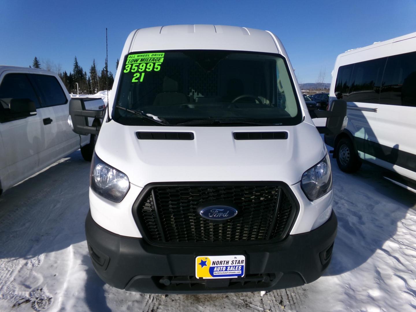 2021 White /Black Ford Transit 250 Van Med. Roof w/Sliding Pass. 148-in. WB (1FTBR2CG2MK) with an 3.5L V6 DOHC 24V engine, 6A transmission, located at 2630 Philips Field Rd., Fairbanks, AK, 99709, (907) 458-0593, 64.848068, -147.780609 - Photo#1