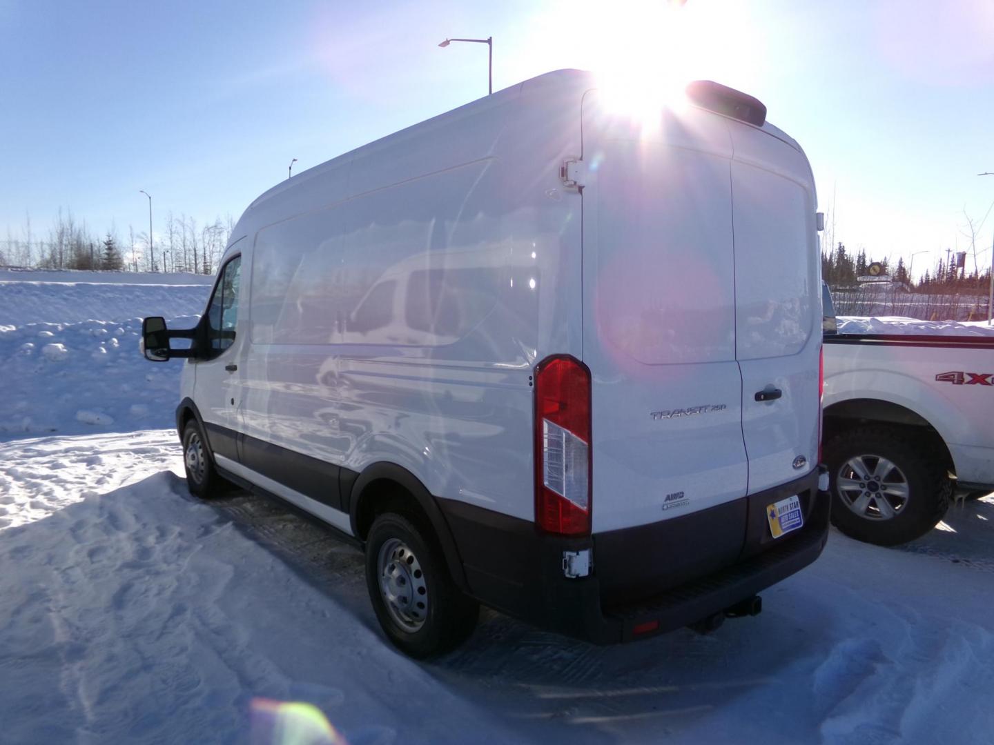 2021 White /Black Ford Transit 250 Van Med. Roof w/Sliding Pass. 148-in. WB (1FTBR2CG2MK) with an 3.5L V6 DOHC 24V engine, 6A transmission, located at 2630 Philips Field Rd., Fairbanks, AK, 99709, (907) 458-0593, 64.848068, -147.780609 - Photo#4
