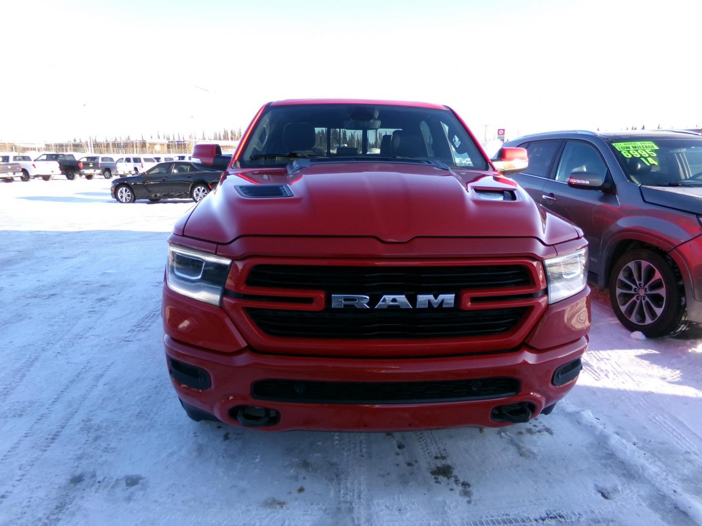 2019 Red RAM 1500 Laramie Crew Cab SWB 4WD (1C6SRFJT7KN) with an 5.7L V8 OHV 16V engine, 8A transmission, located at 2630 Philips Field Rd., Fairbanks, AK, 99709, (907) 458-0593, 64.848068, -147.780609 - Photo#1