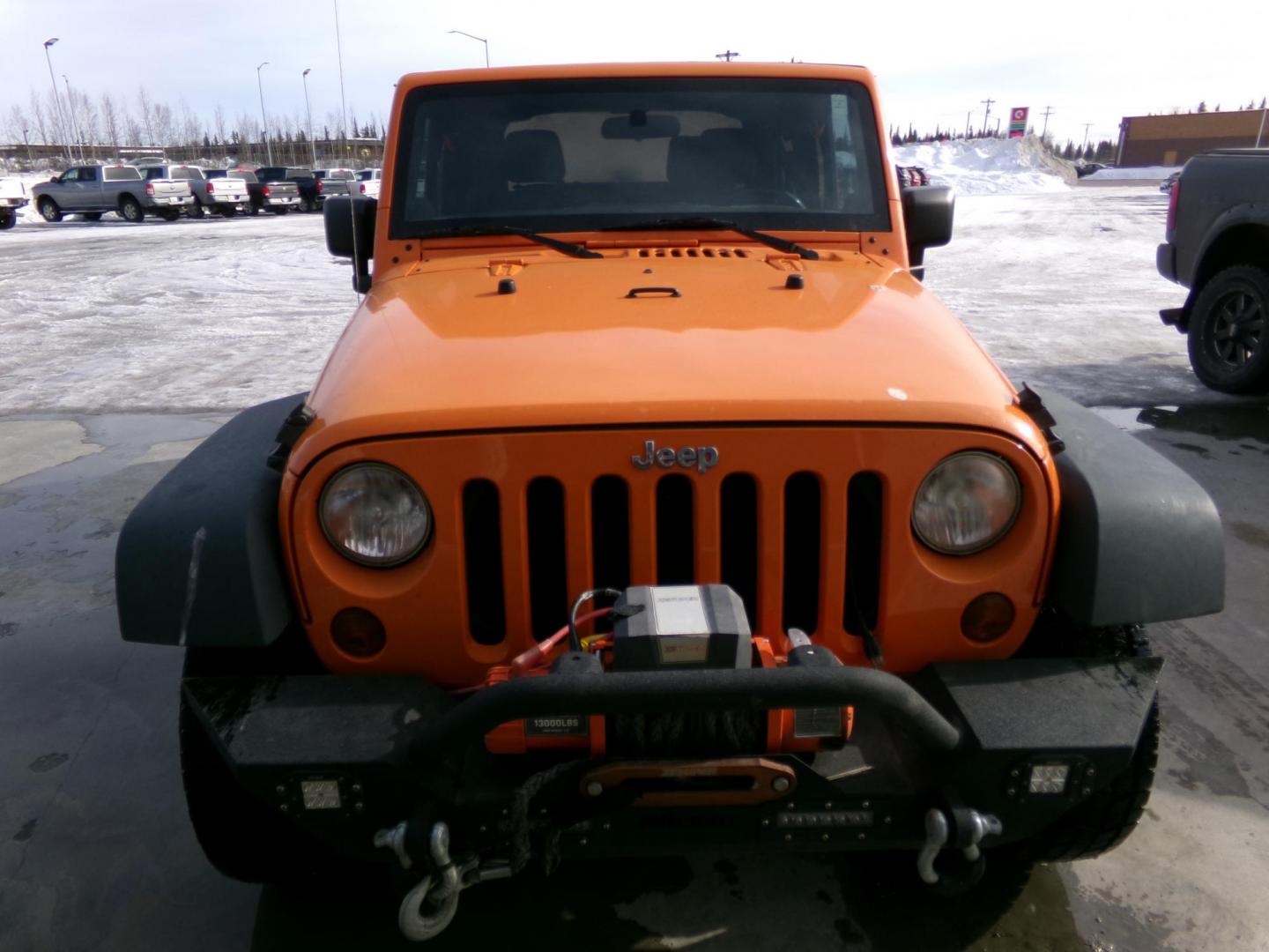 2012 Orange Jeep Wrangler Sport 4WD (1C4AJWAG4CL) with an 3.6L V6 DOHC 24V FFV engine, located at 2630 Philips Field Rd., Fairbanks, AK, 99709, (907) 458-0593, 64.848068, -147.780609 - Photo#1