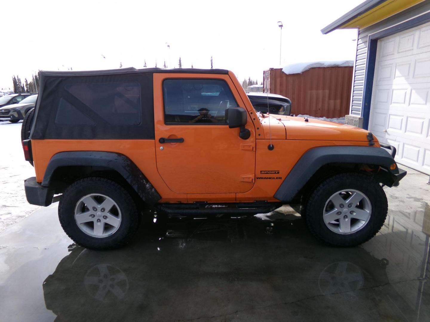 2012 Orange Jeep Wrangler Sport 4WD (1C4AJWAG4CL) with an 3.6L V6 DOHC 24V FFV engine, located at 2630 Philips Field Rd., Fairbanks, AK, 99709, (907) 458-0593, 64.848068, -147.780609 - Photo#2
