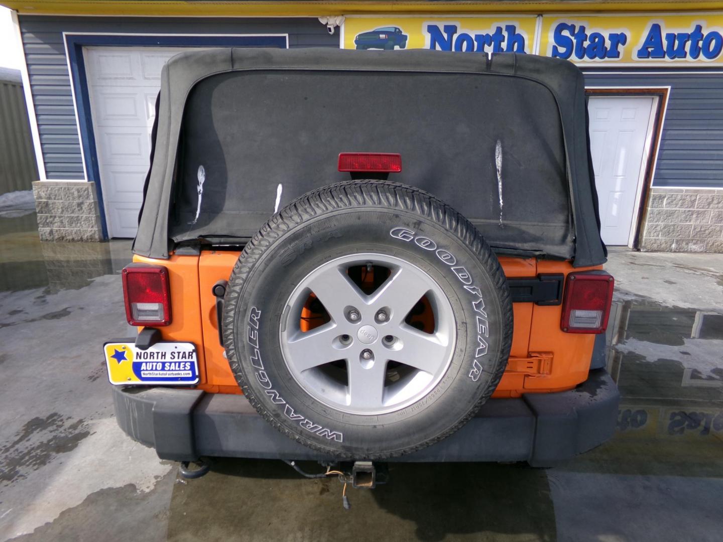 2012 Orange Jeep Wrangler Sport 4WD (1C4AJWAG4CL) with an 3.6L V6 DOHC 24V FFV engine, located at 2630 Philips Field Rd., Fairbanks, AK, 99709, (907) 458-0593, 64.848068, -147.780609 - Photo#3