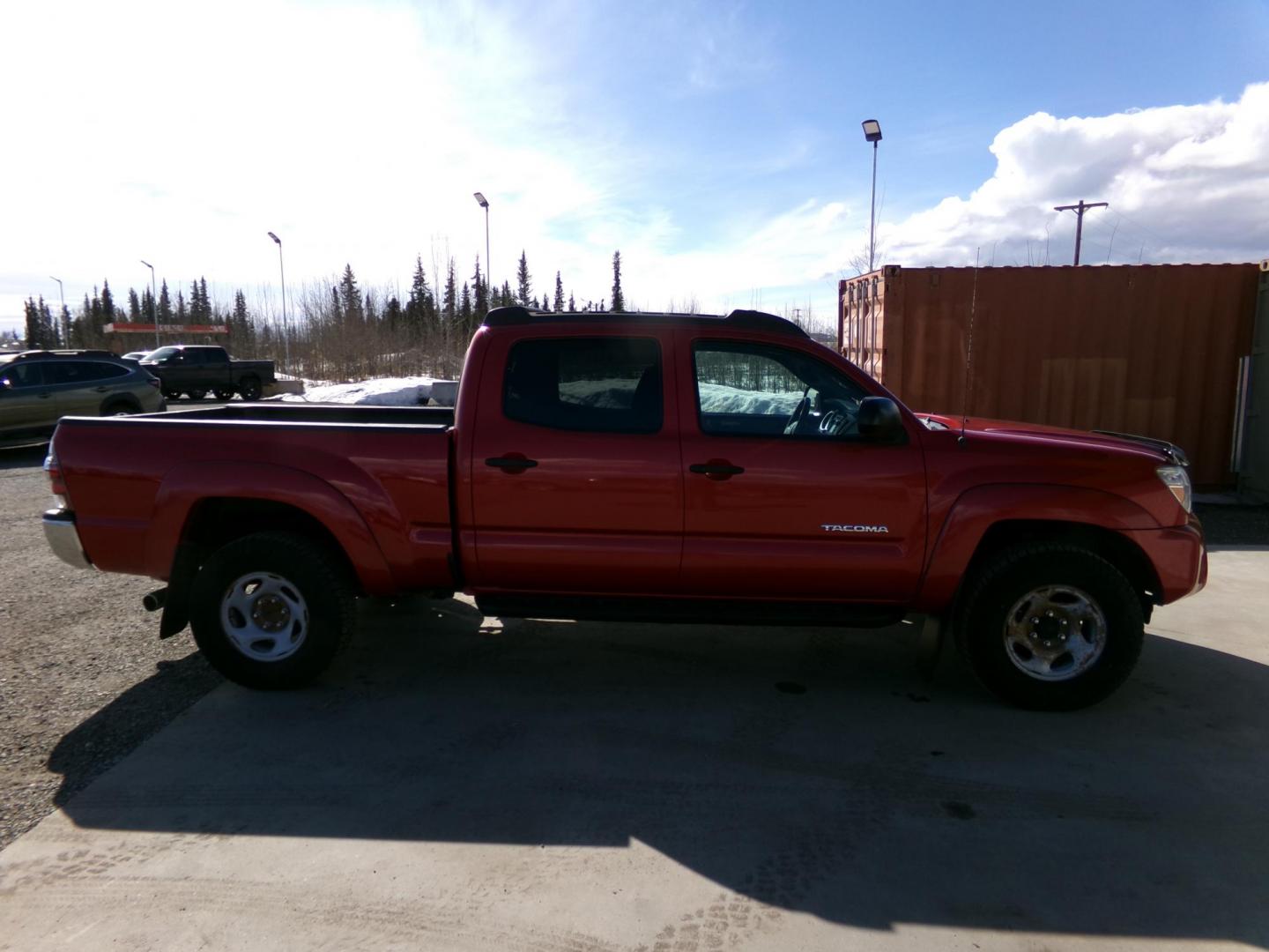 2013 Red /Grey Toyota Tacoma Double Cab Long Bed V6 Auto 4WD (3TMMU4FNXDM) with an 4.0L V6 DOHC 24V engine, 5-Speed Automatic transmission, located at 2630 Philips Field Rd., Fairbanks, AK, 99709, (907) 458-0593, 64.848068, -147.780609 - Photo#2