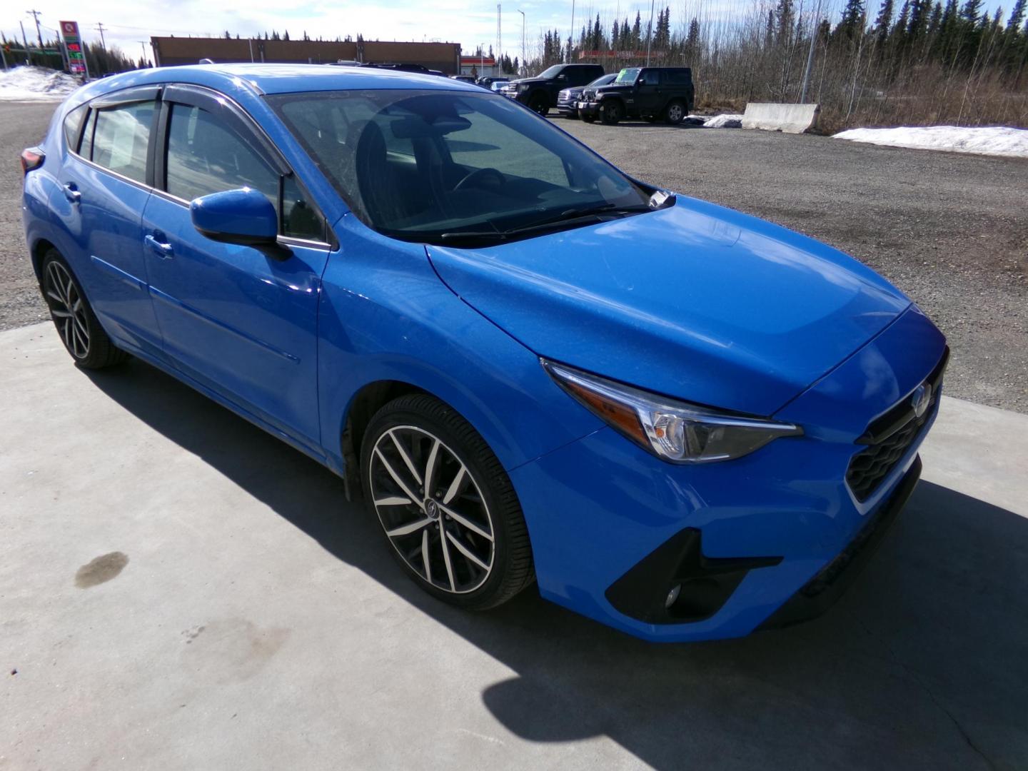 2024 Blue Subaru Impreza Sport 5-Door (JF1GUAFC4R8) with an 2.0L H4 DOHC 16V engine, CVT transmission, located at 2630 Philips Field Rd., Fairbanks, AK, 99709, (907) 458-0593, 64.848068, -147.780609 - Photo#0