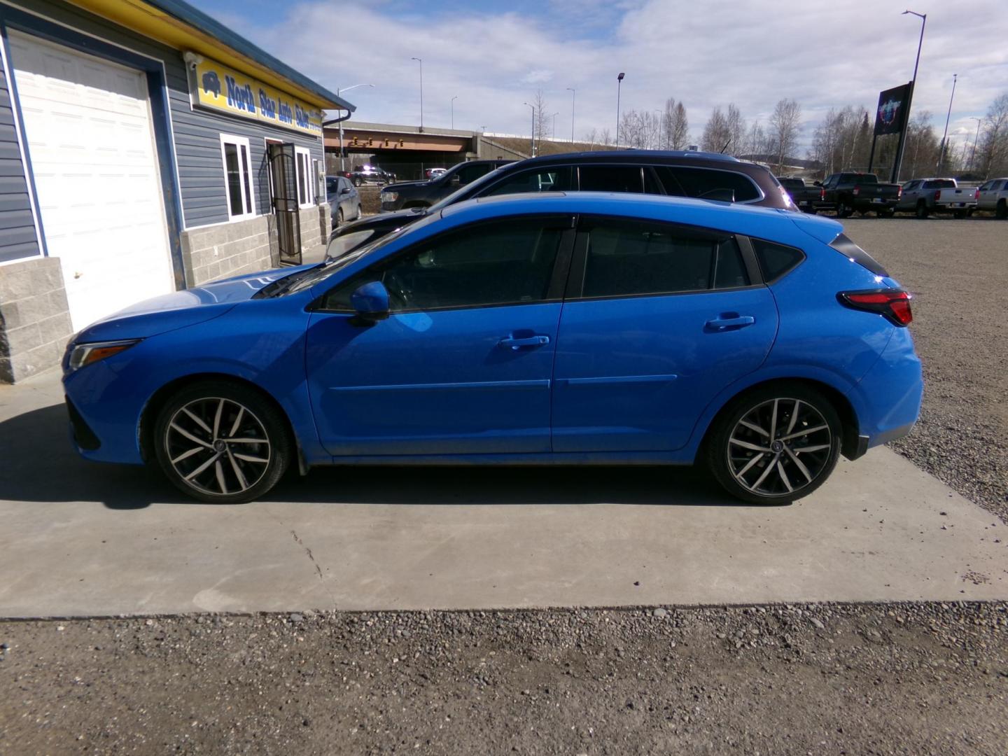 2024 Blue Subaru Impreza Sport 5-Door (JF1GUAFC4R8) with an 2.0L H4 DOHC 16V engine, CVT transmission, located at 2630 Philips Field Rd., Fairbanks, AK, 99709, (907) 458-0593, 64.848068, -147.780609 - Photo#2