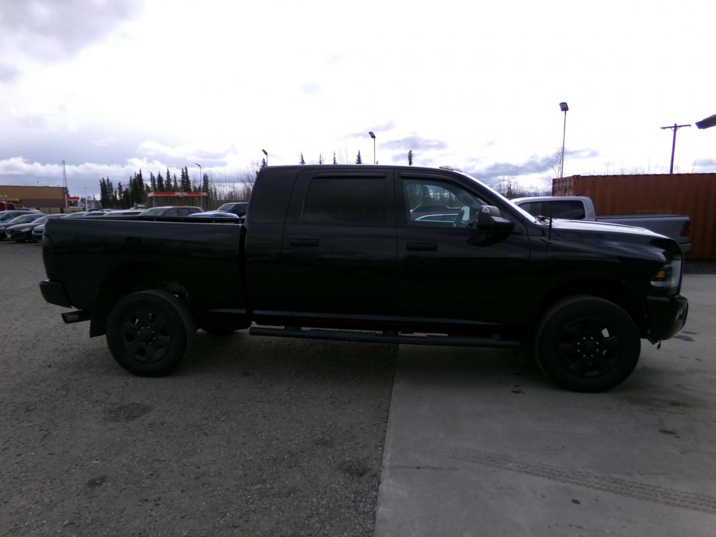 2015 Black Dodge 2500 SLT Mega Cab 4WD (3C6UR5MJ7FG) with an 6.4L V8 engine, 6A transmission, located at 2630 Philips Field Rd., Fairbanks, AK, 99709, (907) 458-0593, 64.848068, -147.780609 - Photo#2