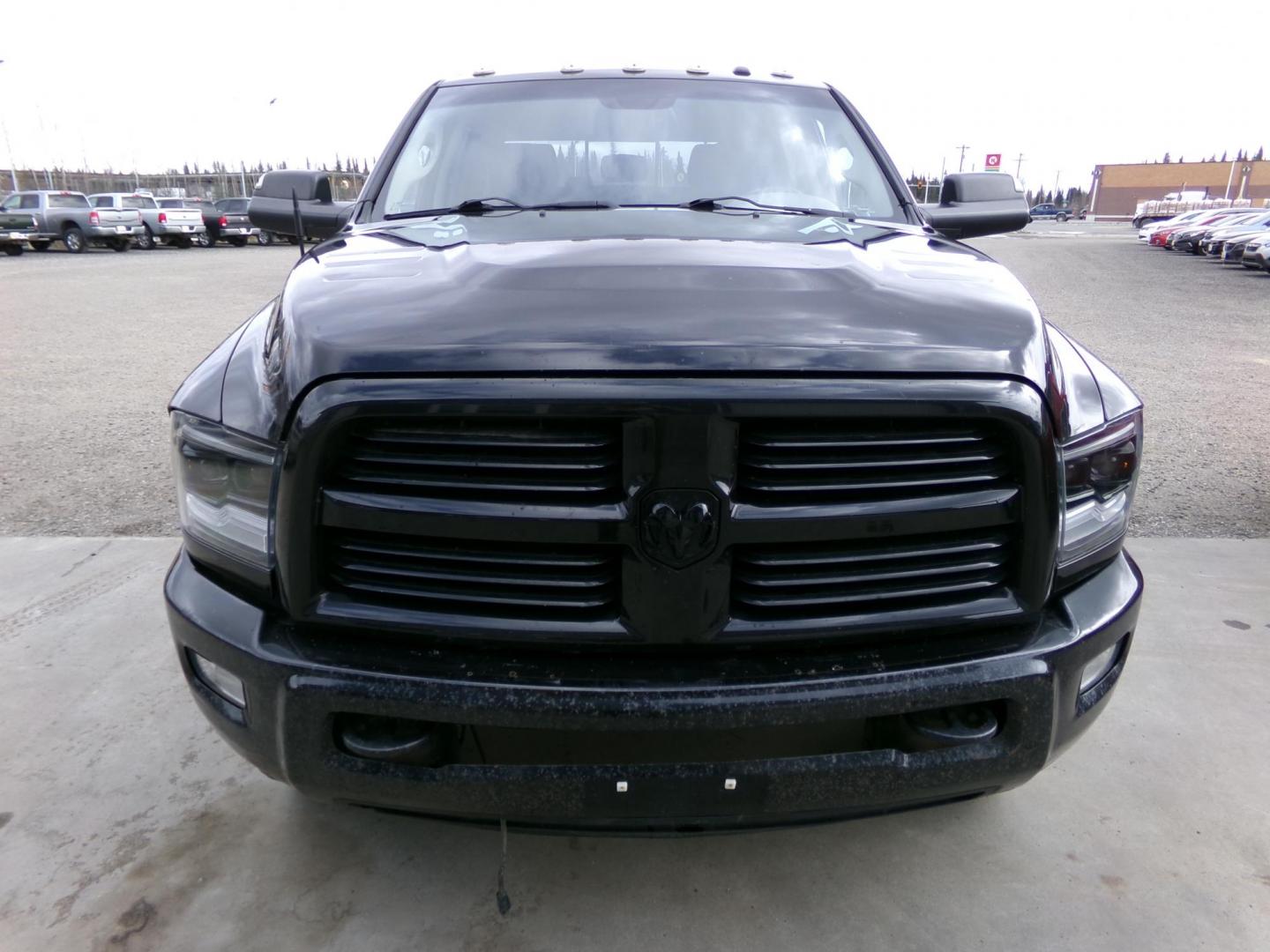 2015 Black Dodge 2500 SLT Mega Cab 4WD (3C6UR5MJ7FG) with an 6.4L V8 engine, 6A transmission, located at 2630 Philips Field Rd., Fairbanks, AK, 99709, (907) 458-0593, 64.848068, -147.780609 - Photo#1