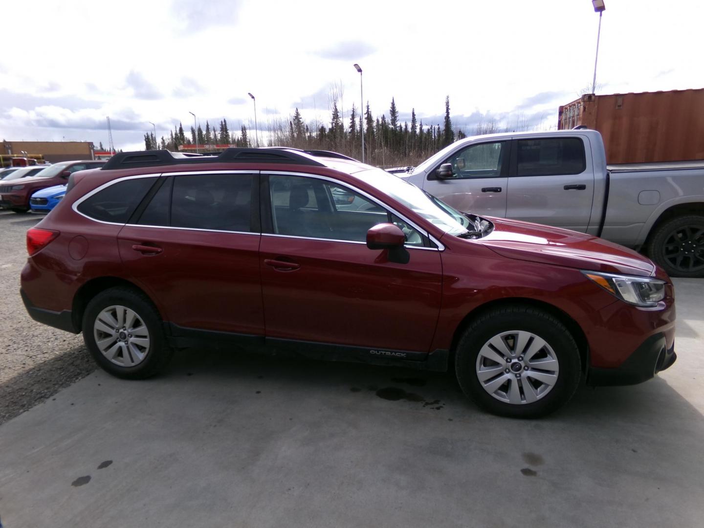 2018 Red Subaru Outback 2.5i Premium (4S4BSACC0J3) with an 2.5L H4 DOHC 16V engine, CVT transmission, located at 2630 Philips Field Rd., Fairbanks, AK, 99709, (907) 458-0593, 64.848068, -147.780609 - Photo#2