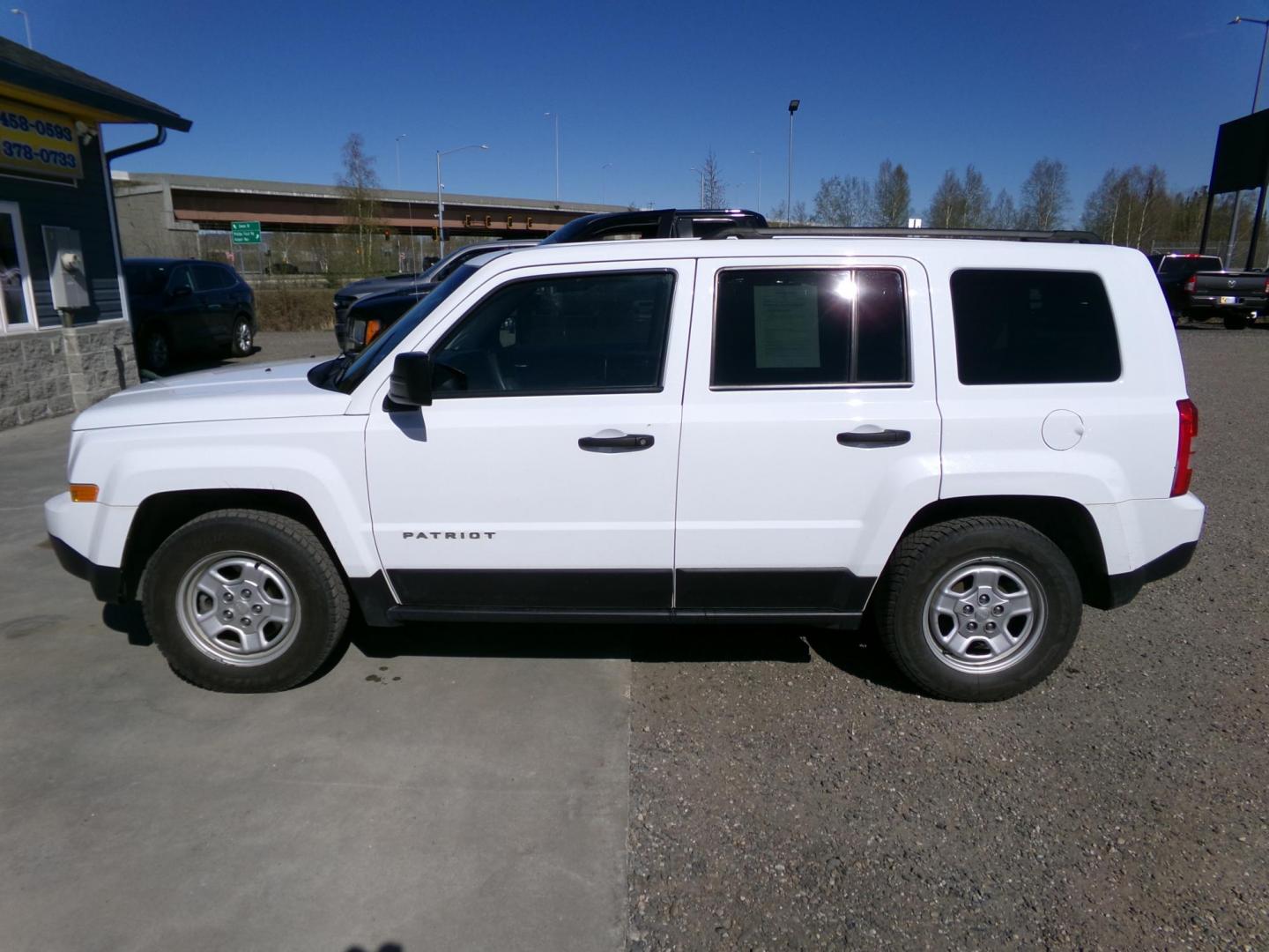 2016 White Jeep Patriot Sport 2WD (1C4NJPBAXGD) with an 2.0L L4 DOHC 16V engine, located at 2630 Philips Field Rd., Fairbanks, AK, 99709, (907) 458-0593, 64.848068, -147.780609 - Photo#2