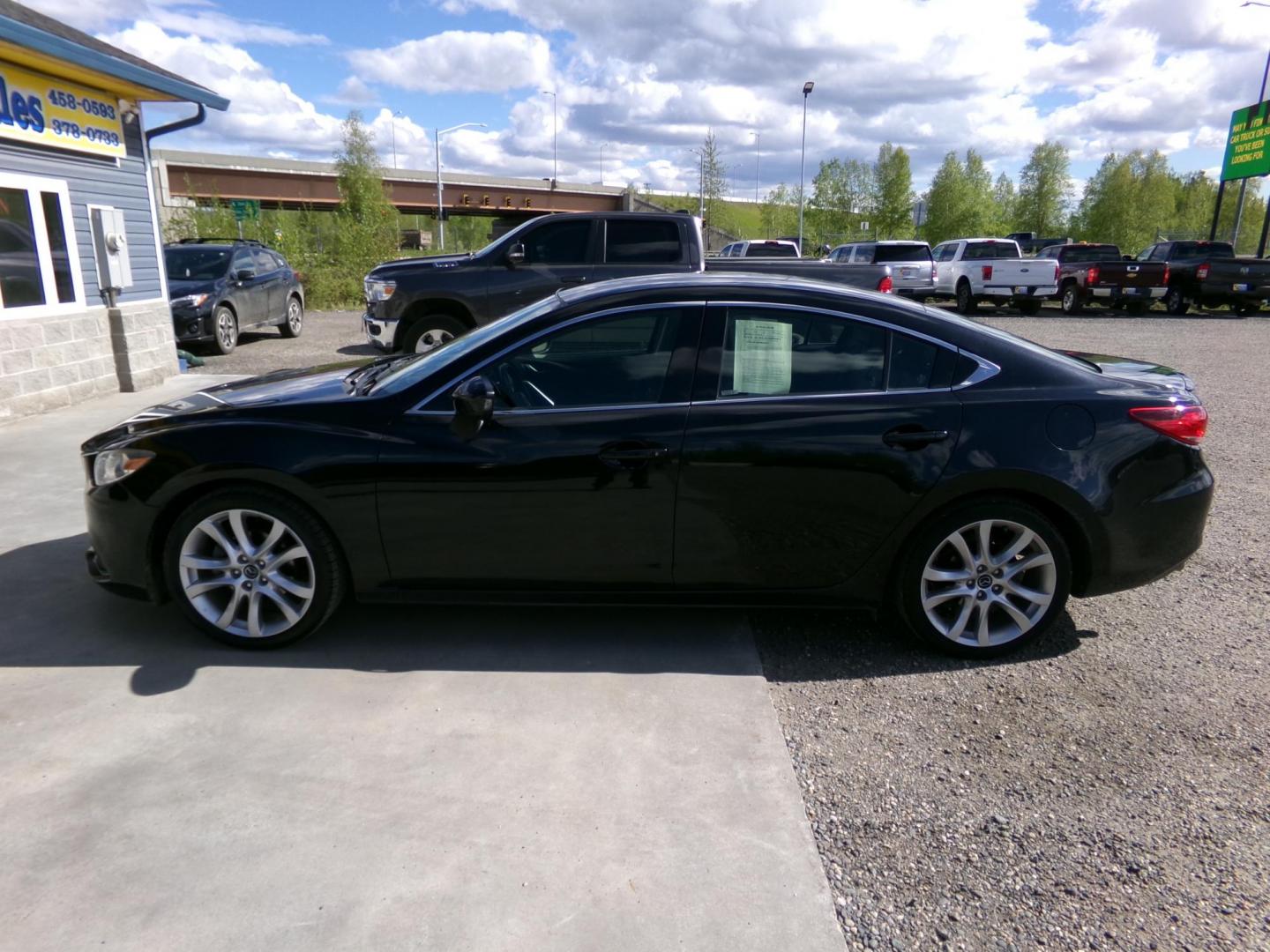 2015 Black Mazda Mazda6 i Touring (JM1GJ1V52F1) with an 2.5L L4 DOHC 16V engine, 6-Speed Automatic transmission, located at 2630 Philips Field Rd., Fairbanks, AK, 99709, (907) 458-0593, 64.848068, -147.780609 - Photo#2