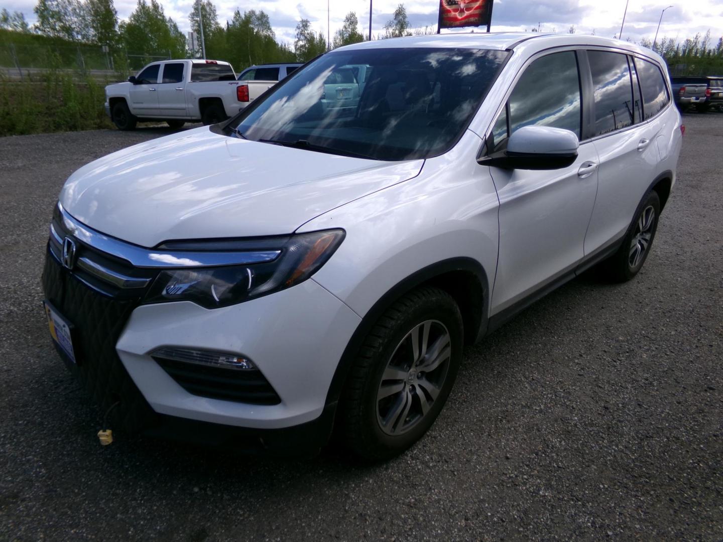 2016 White Honda Pilot EXL 4WD (5FNYF6H56GB) with an 3.5L V6 SOHC 24V engine, 6-Speed Automatic transmission, located at 2630 Philips Field Rd., Fairbanks, AK, 99709, (907) 458-0593, 64.848068, -147.780609 - Photo#0