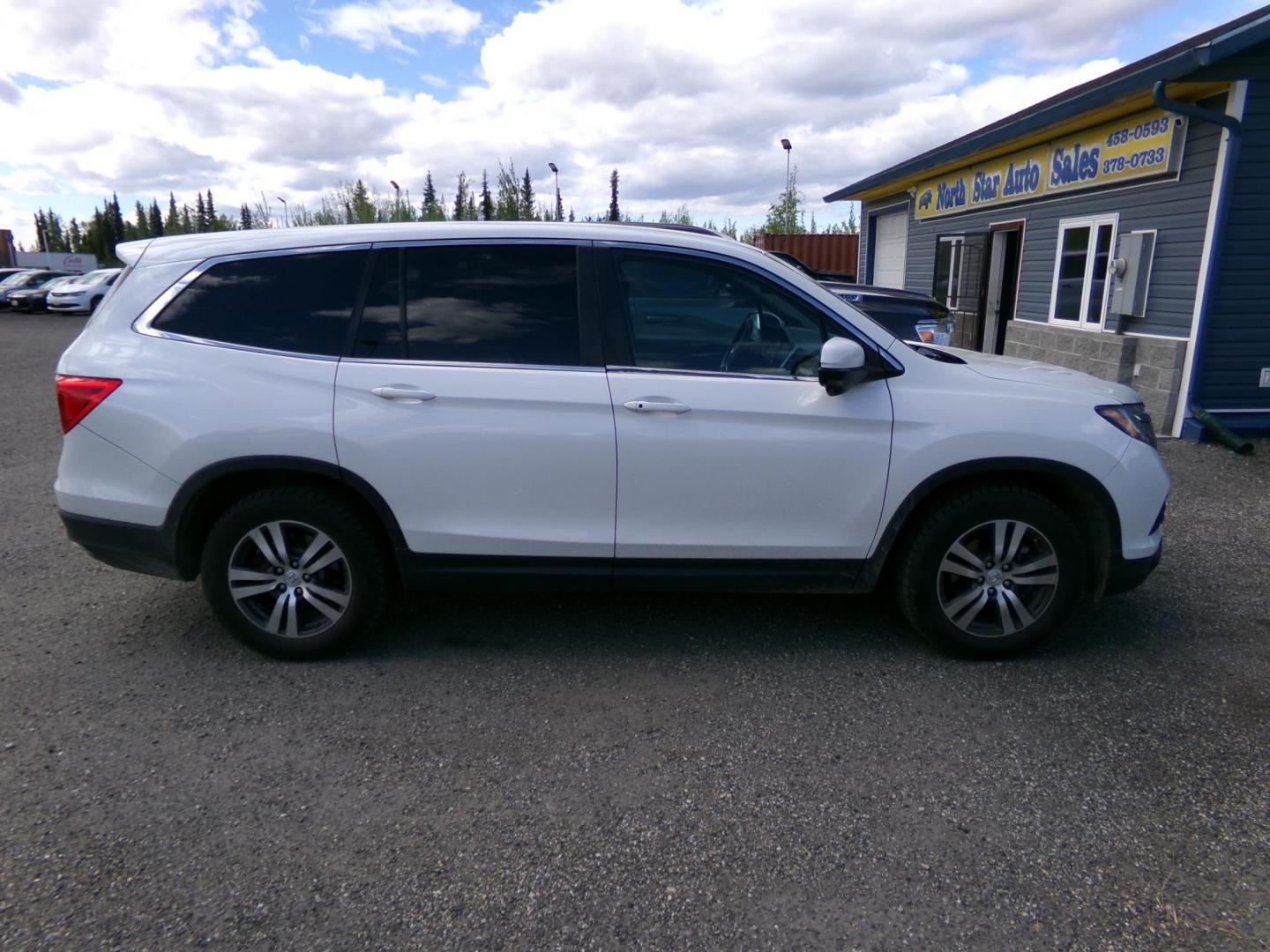 2016 White Honda Pilot EXL 4WD (5FNYF6H56GB) with an 3.5L V6 SOHC 24V engine, 6-Speed Automatic transmission, located at 2630 Philips Field Rd., Fairbanks, AK, 99709, (907) 458-0593, 64.848068, -147.780609 - Photo#2
