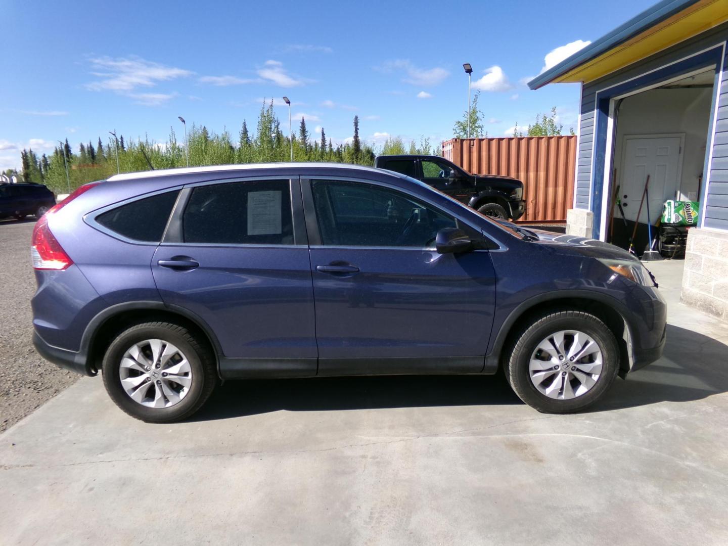 2013 Blue Honda CR-V EX-L 4WD 5-Speed AT (2HKRM4H74DH) with an 2.4L L4 DOHC 16V engine, 5-Speed Automatic transmission, located at 2630 Philips Field Rd., Fairbanks, AK, 99709, (907) 458-0593, 64.848068, -147.780609 - Photo#2