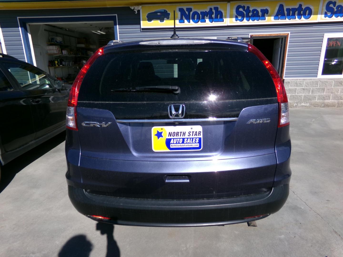 2013 Blue Honda CR-V EX-L 4WD 5-Speed AT (2HKRM4H74DH) with an 2.4L L4 DOHC 16V engine, 5-Speed Automatic transmission, located at 2630 Philips Field Rd., Fairbanks, AK, 99709, (907) 458-0593, 64.848068, -147.780609 - Photo#3