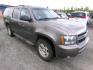 2011 Brown Chevrolet Suburban LT 1500 4WD (1GNSKJE35BR) with an 5.3L V8 OHV 16V FFV engine, 4-Speed Automatic transmission, located at 2630 Philips Field Rd., Fairbanks, AK, 99709, (907) 458-0593, 64.848068, -147.780609 - Photo#0