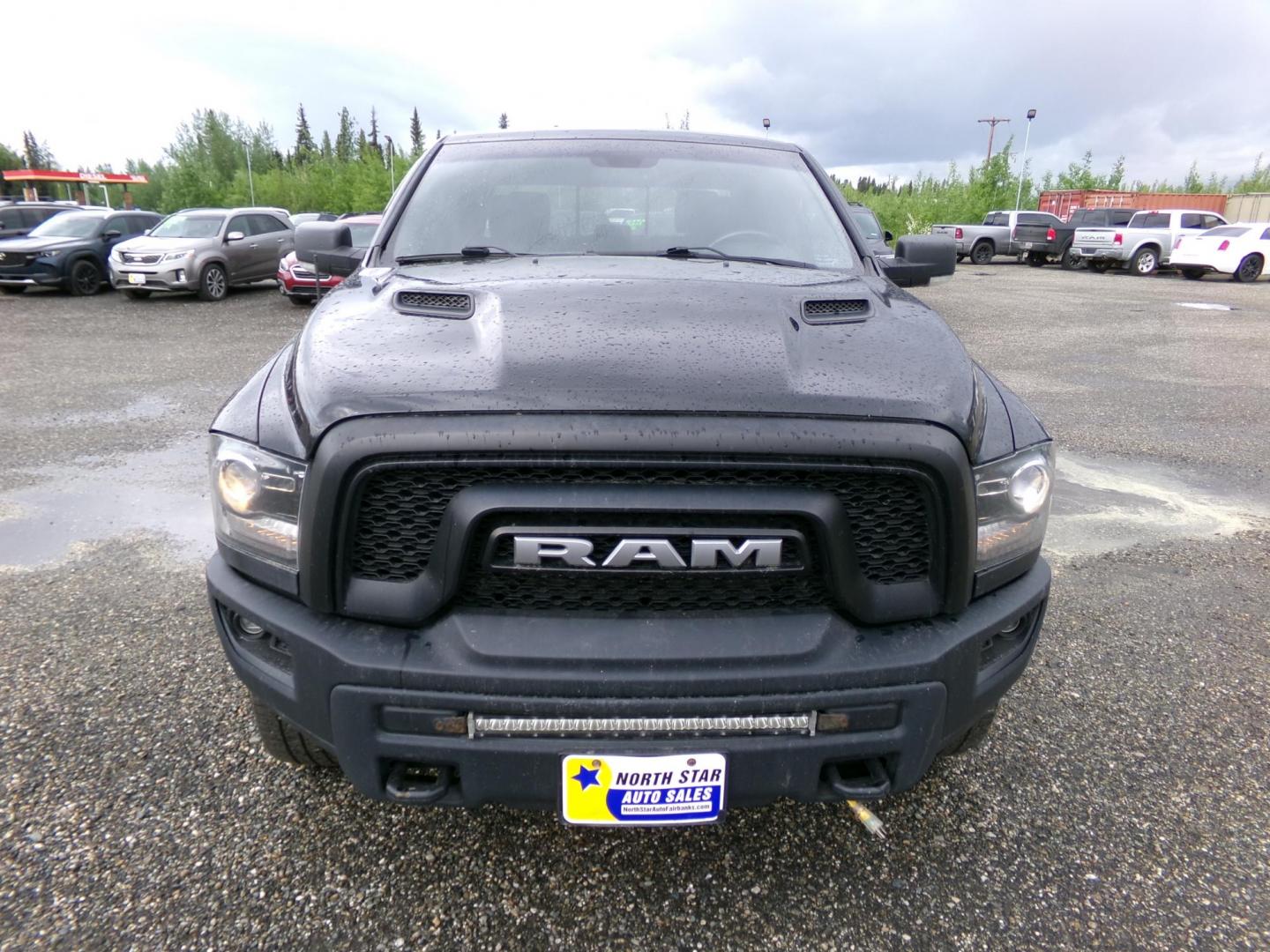 2018 Black Dodge 1500 Rebel Crew Cab SWB 4WD (1C6RR7YT3JS) with an 5.7L V8 OHV 16V engine, 8A transmission, located at 2630 Philips Field Rd., Fairbanks, AK, 99709, (907) 458-0593, 64.848068, -147.780609 - Photo#1