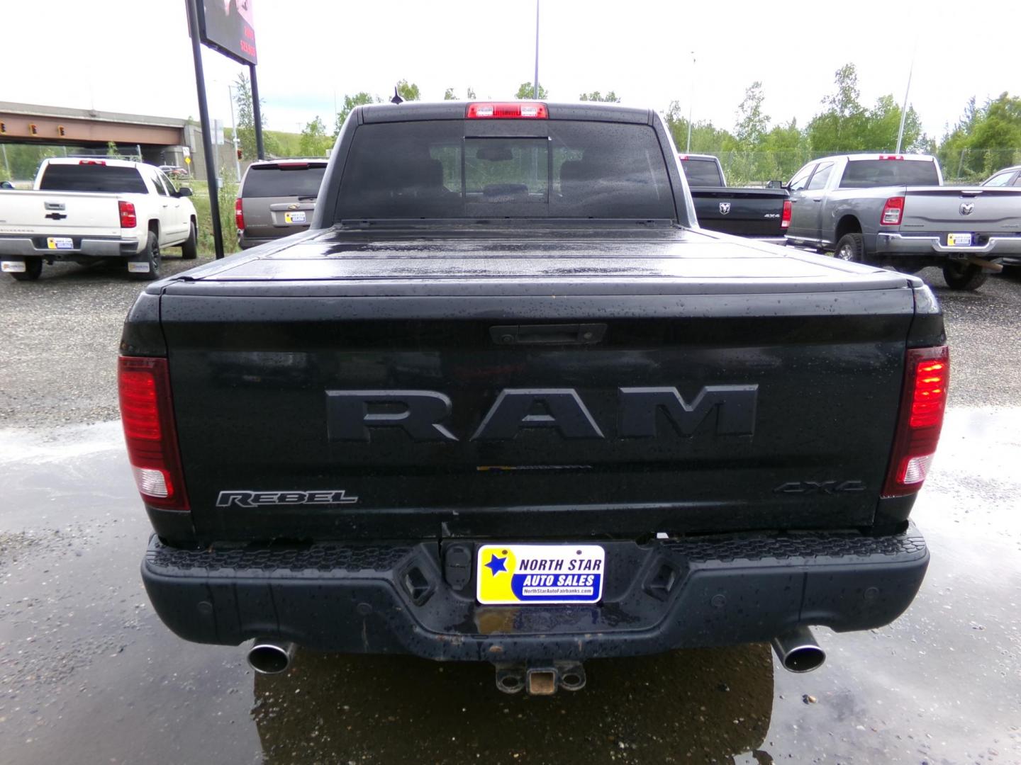 2018 Black Dodge 1500 Rebel Crew Cab SWB 4WD (1C6RR7YT3JS) with an 5.7L V8 OHV 16V engine, 8A transmission, located at 2630 Philips Field Rd., Fairbanks, AK, 99709, (907) 458-0593, 64.848068, -147.780609 - Photo#3