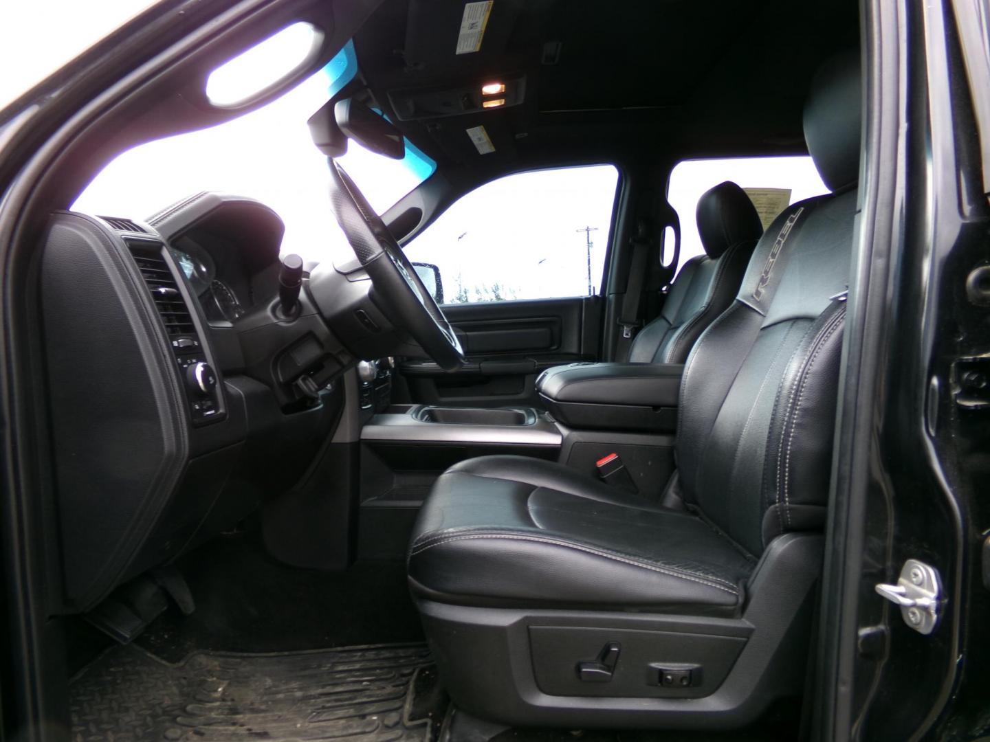 2018 Black Dodge 1500 Rebel Crew Cab SWB 4WD (1C6RR7YT3JS) with an 5.7L V8 OHV 16V engine, 8A transmission, located at 2630 Philips Field Rd., Fairbanks, AK, 99709, (907) 458-0593, 64.848068, -147.780609 - Photo#4