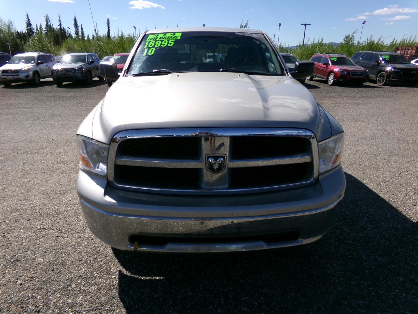 2010 Gold Dodge Ram 1500 Laramie Quad Cab 4WD (1D7RV1GP2AS) with an 4.7L V8 SOHC 16V FFV engine, 5-Speed Automatic transmission, located at 2630 Philips Field Rd., Fairbanks, AK, 99709, (907) 458-0593, 64.848068, -147.780609 - Photo#1