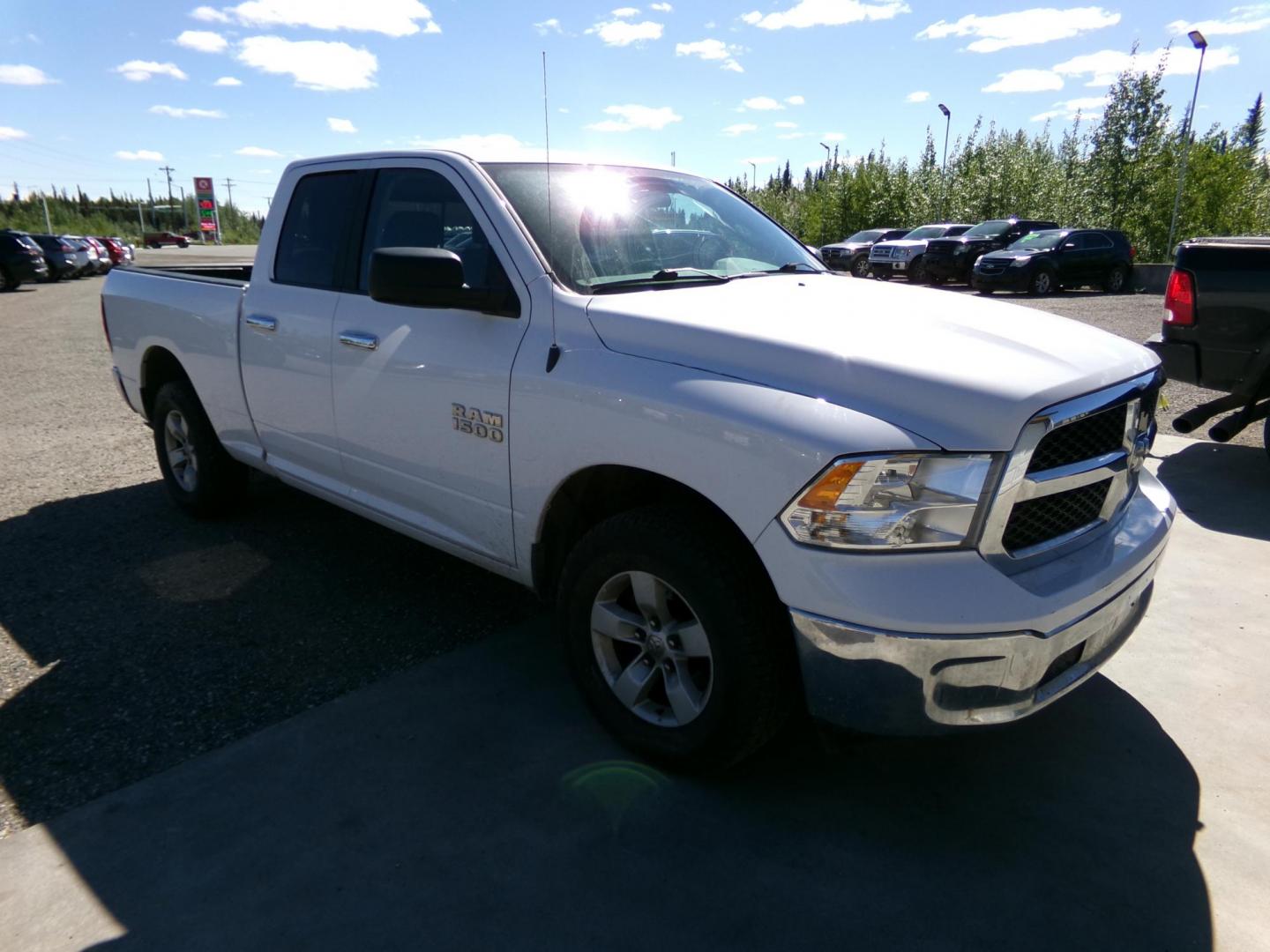 2017 White Dodge 1500 SLT Quad Cab 4WD (1C6RR7GGXHS) with an 3.6L V6 DOHC 24V FFV engine, 8A transmission, located at 2630 Philips Field Rd., Fairbanks, AK, 99709, (907) 458-0593, 64.848068, -147.780609 - Photo#0