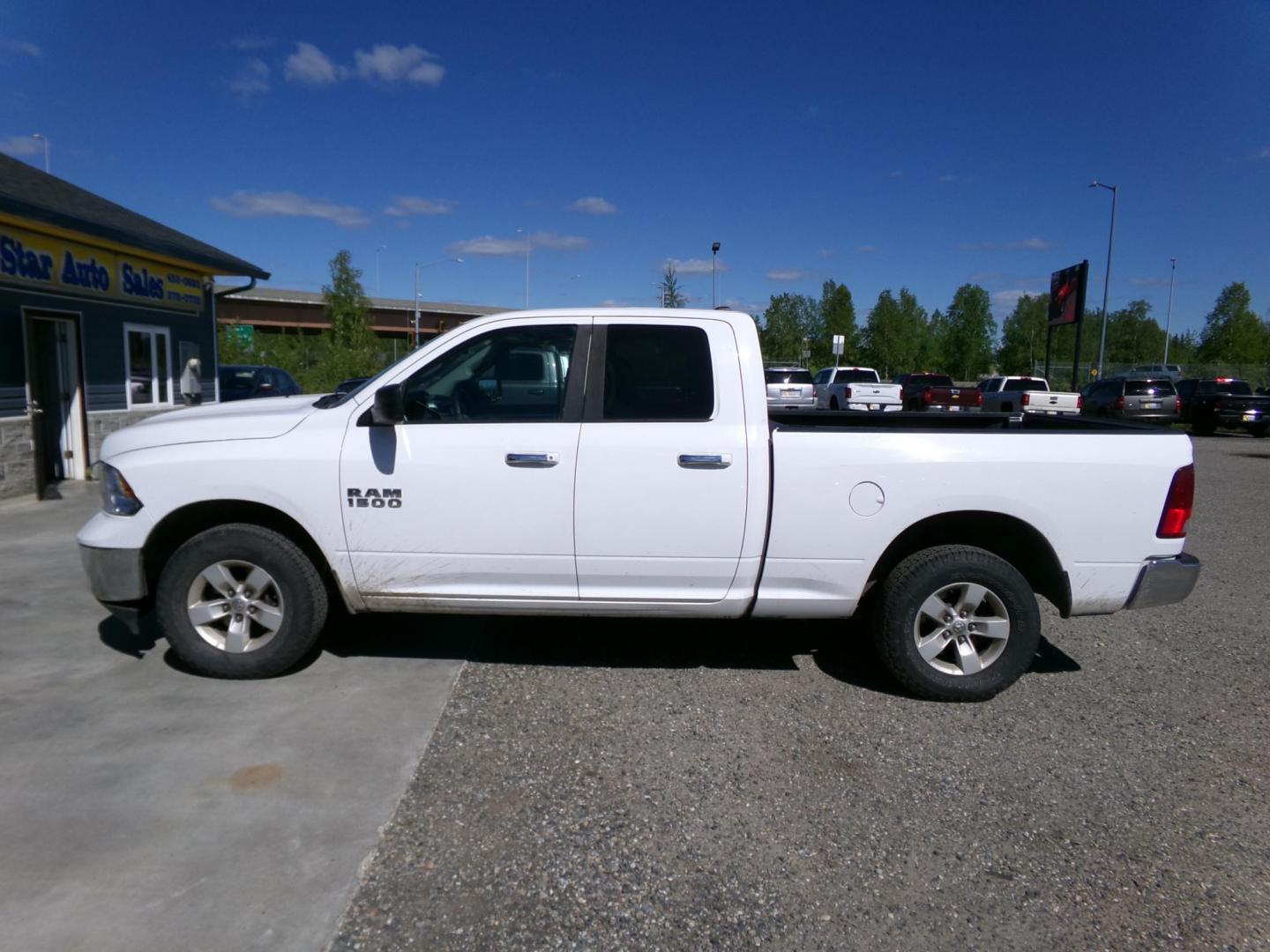2017 White Dodge 1500 SLT Quad Cab 4WD (1C6RR7GGXHS) with an 3.6L V6 DOHC 24V FFV engine, 8A transmission, located at 2630 Philips Field Rd., Fairbanks, AK, 99709, (907) 458-0593, 64.848068, -147.780609 - Photo#2