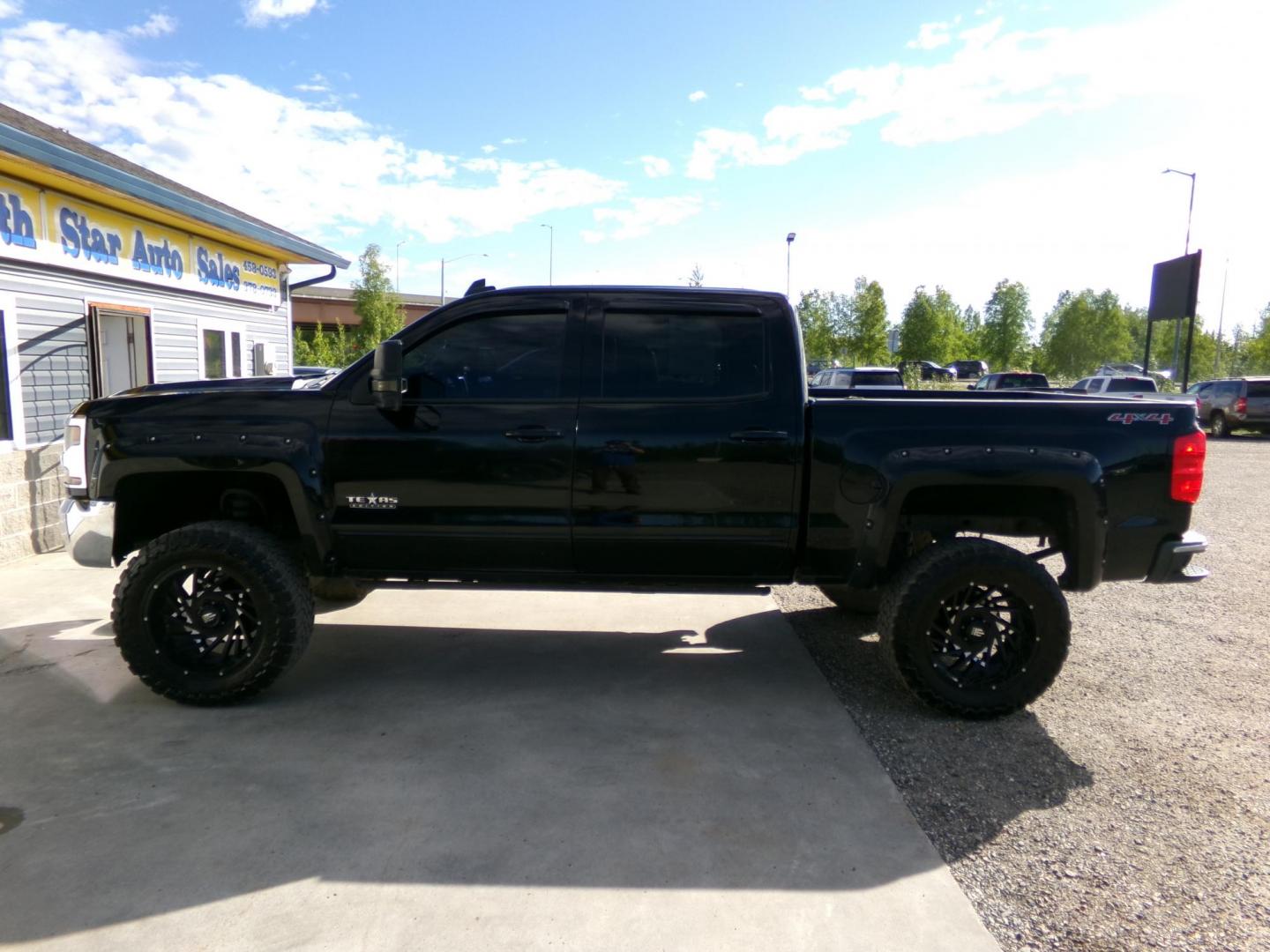 2016 Black Chevrolet Silverado 1500 LT Crew Cab 4WD (3GCUKREC6GG) with an 5.3L V8 OHV 16V engine, 6A transmission, located at 2630 Philips Field Rd., Fairbanks, AK, 99709, (907) 458-0593, 64.848068, -147.780609 - Photo#2