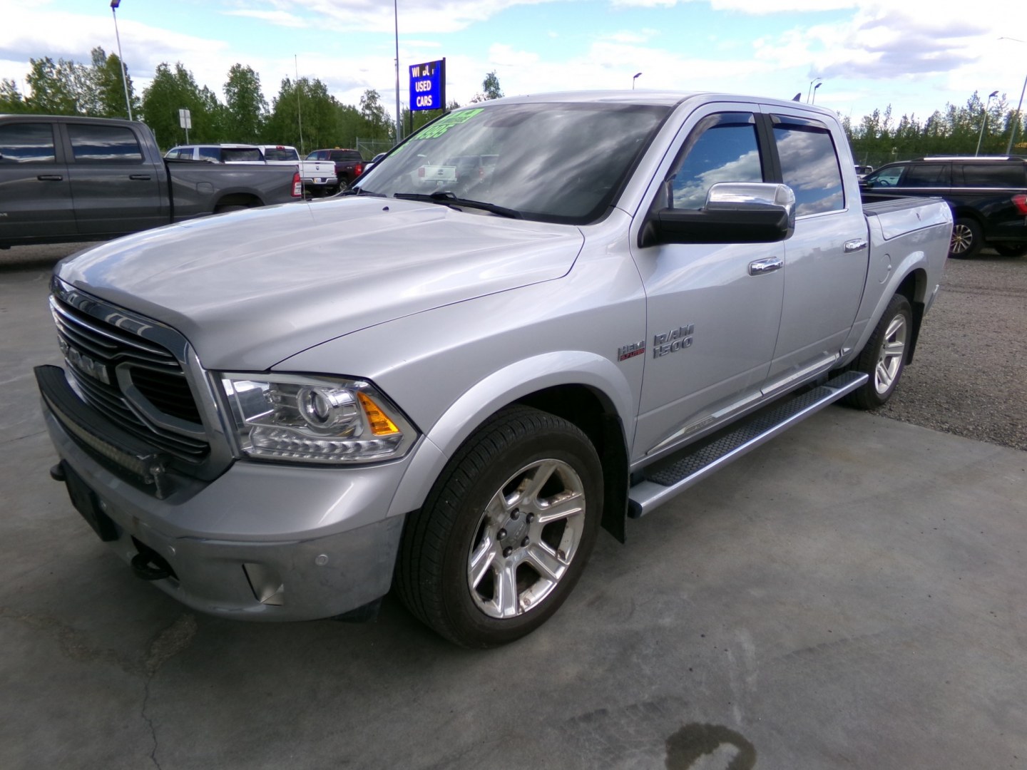 2016 Silver Dodge 1500 Longhorn Crew Cab SWB 4WD (1C6RR7PT6GS) with an 5.7L V8 OHV 16V engine, 6A transmission, located at 2630 Philips Field Rd., Fairbanks, AK, 99709, (907) 458-0593, 64.848068, -147.780609- Photo#0