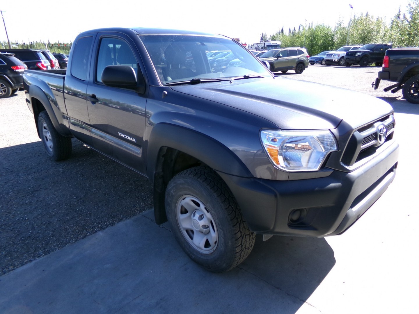 2014 Grey Toyota Tacoma Access Cab I4 5MT 4WD (5TFUX4EN0EX) with an 2.7L L4 DOHC 16V engine, 5-Speed Manual transmission, located at 2630 Philips Field Rd., Fairbanks, AK, 99709, (907) 458-0593, 64.848068, -147.780609- Photo#0