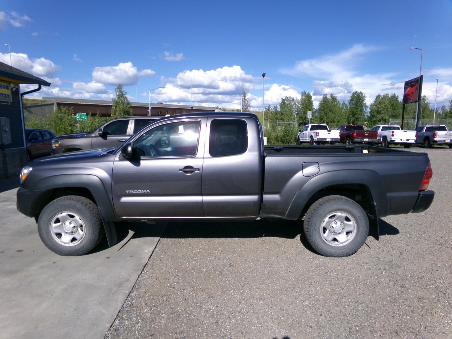 2014 Grey Toyota Tacoma Access Cab I4 5MT 4WD (5TFUX4EN0EX) with an 2.7L L4 DOHC 16V engine, 5-Speed Manual transmission, located at 2630 Philips Field Rd., Fairbanks, AK, 99709, (907) 458-0593, 64.848068, -147.780609- Photo#2