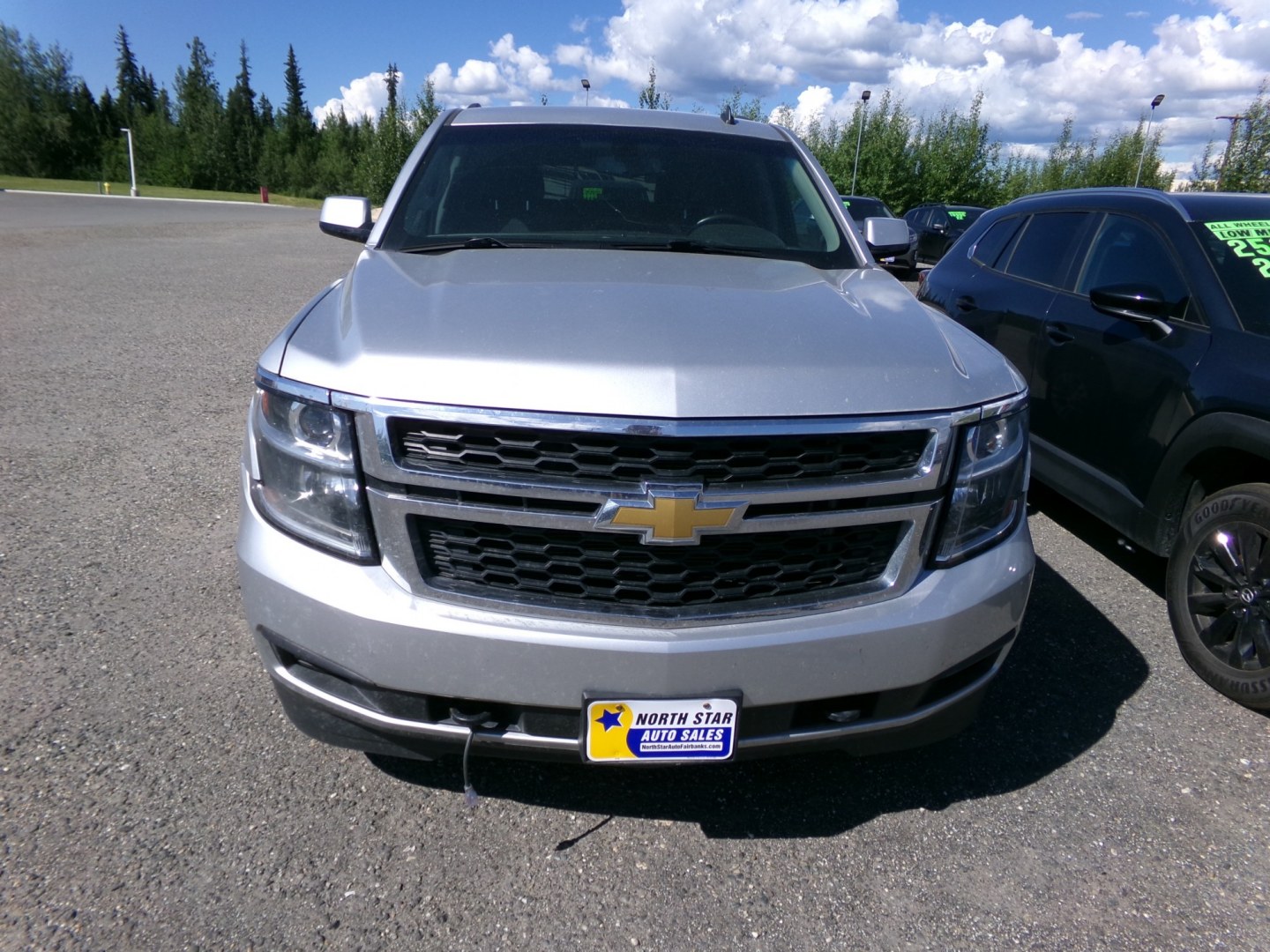 2015 Silver Chevrolet Tahoe LS 4WD (1GNSKAEC0FR) with an 5.3L V8 OHV 16V engine, 6-Speed Automatic transmission, located at 2630 Philips Field Rd., Fairbanks, AK, 99709, (907) 458-0593, 64.848068, -147.780609- Photo#1