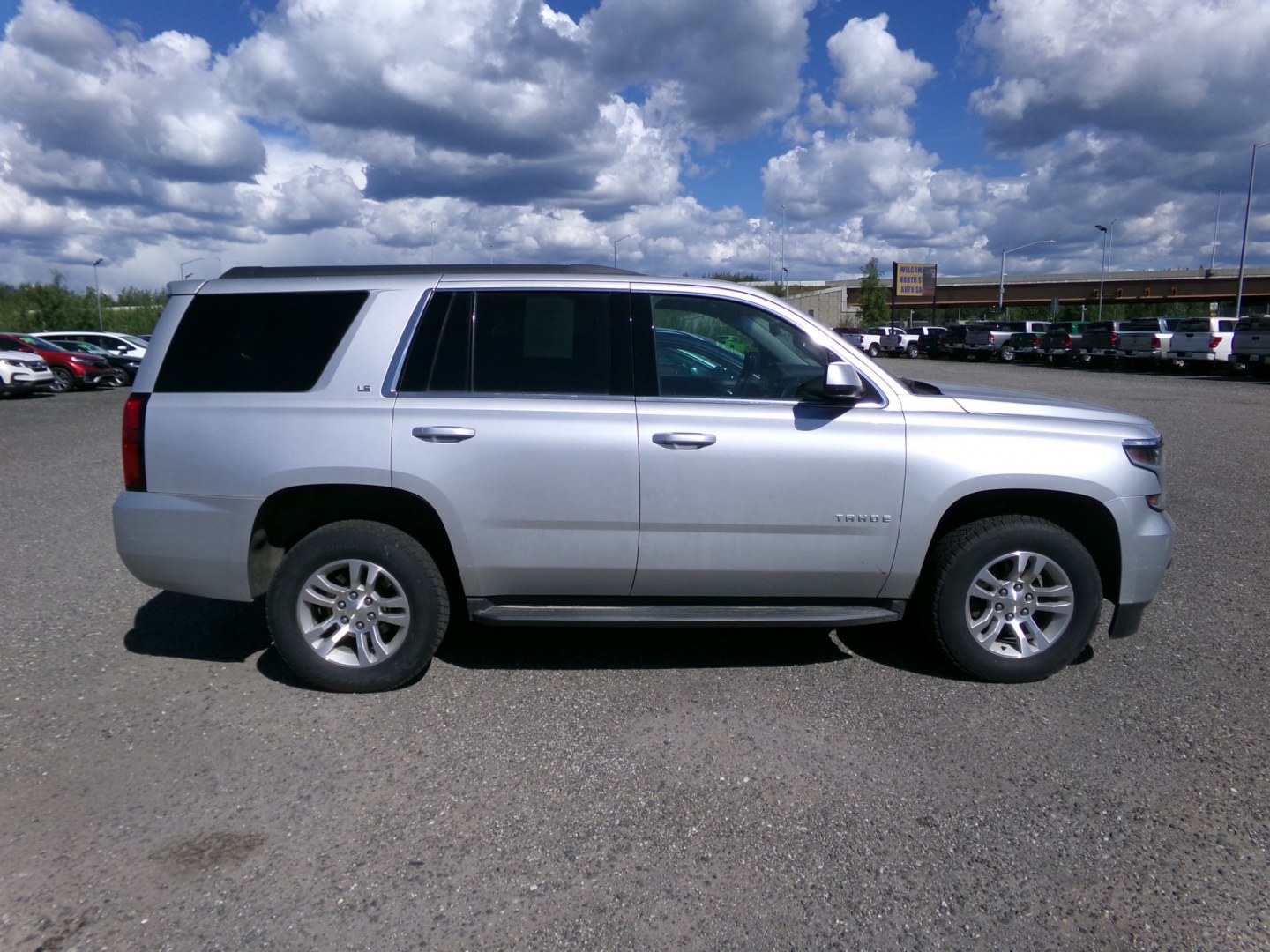 2015 Silver Chevrolet Tahoe LS 4WD (1GNSKAEC0FR) with an 5.3L V8 OHV 16V engine, 6-Speed Automatic transmission, located at 2630 Philips Field Rd., Fairbanks, AK, 99709, (907) 458-0593, 64.848068, -147.780609- Photo#2