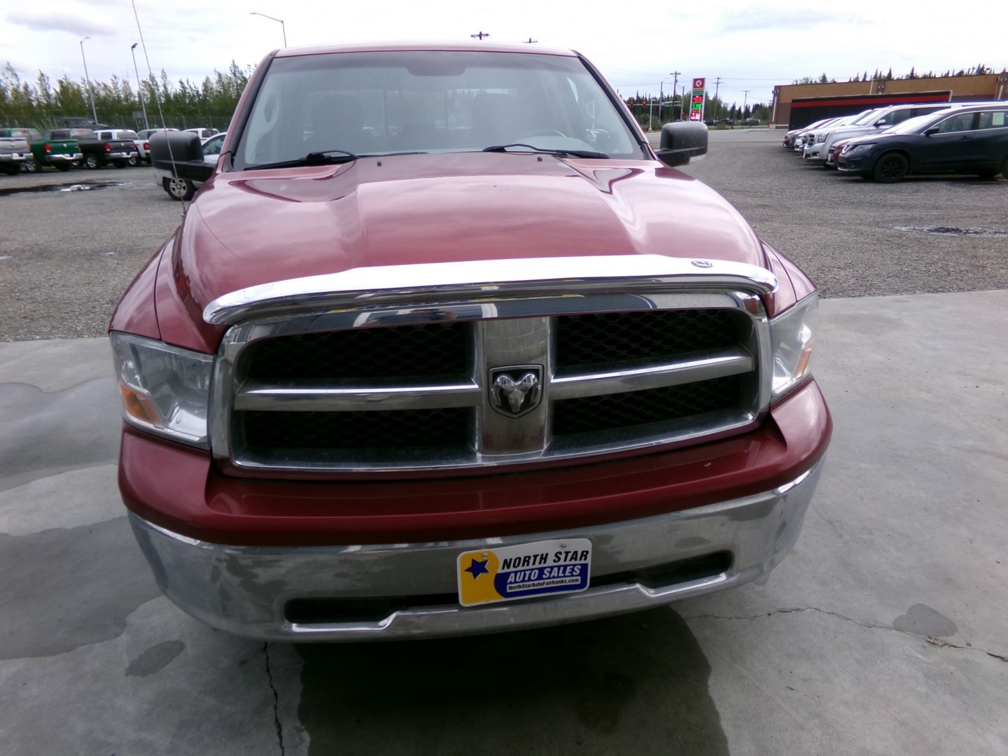 2011 Red Dodge Ram 1500 Sport Quad Cab 4WD (1D7RV1GT2BS) with an 5.7L V8 OHV 16V engine, 5-Speed Automatic transmission, located at 2630 Philips Field Rd., Fairbanks, AK, 99709, (907) 458-0593, 64.848068, -147.780609- Photo#1