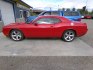 2012 Red Dodge Challenger SXT (2C3CDYAG5CH) with an 3.6L V6 DOHC 24V engine, 4-Speed Automatic transmission, located at 2630 Philips Field Rd., Fairbanks, AK, 99709, (907) 458-0593, 64.848068, -147.780609- Photo#2