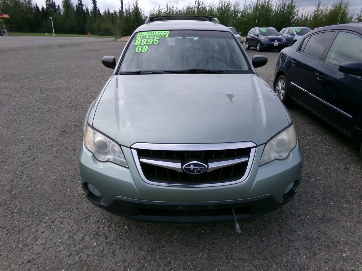 2009 Blue Subaru Outback 2.5i (4S4BP61C396) with an 2.5L H4 SOHC 16V engine, 4A transmission, located at 2630 Philips Field Rd., Fairbanks, AK, 99709, (907) 458-0593, 64.848068, -147.780609- Photo#1