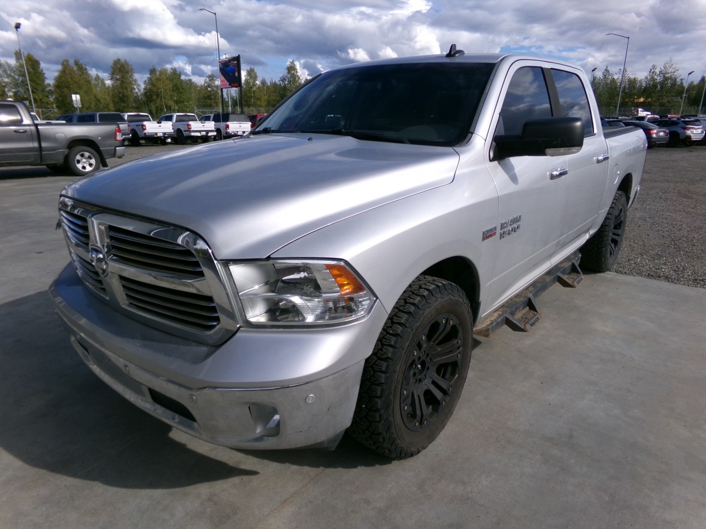 2016 Silver Dodge 1500 SLT Crew Cab SWB 4WD (3C6RR7LT3GG) with an 5.7L V8 OHV 16V engine, 6A transmission, located at 2630 Philips Field Rd., Fairbanks, AK, 99709, (907) 458-0593, 64.848068, -147.780609- Photo#0