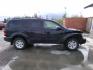 2005 Black Dodge Durango Adventurer Model 4WD (1D4HB48D45F) with an 5.7L V8 OHV 16V engine, 5A OD transmission, located at 2630 Philips Field Rd., Fairbanks, AK, 99709, (907) 458-0593, 64.848068, -147.780609- Photo#2